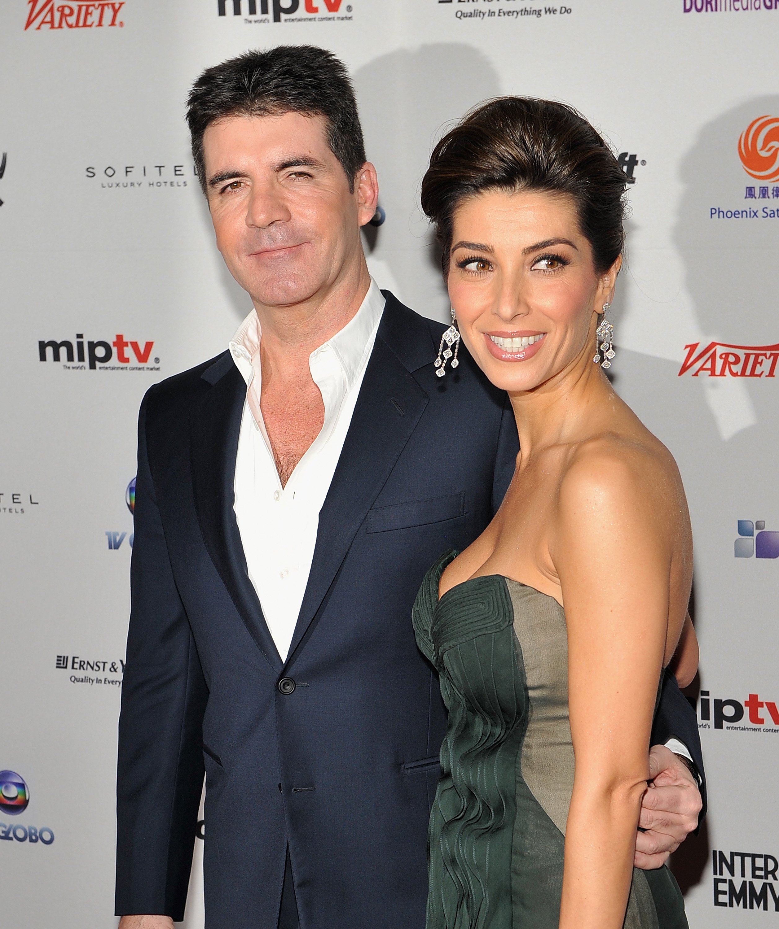 Simon Cowell and his fiancee Mezhgan Hussainy attend the 38th International Emmy Awards at the New York Hilton and Towers on November 22, 2010 in New York City | Source: Getty Images 