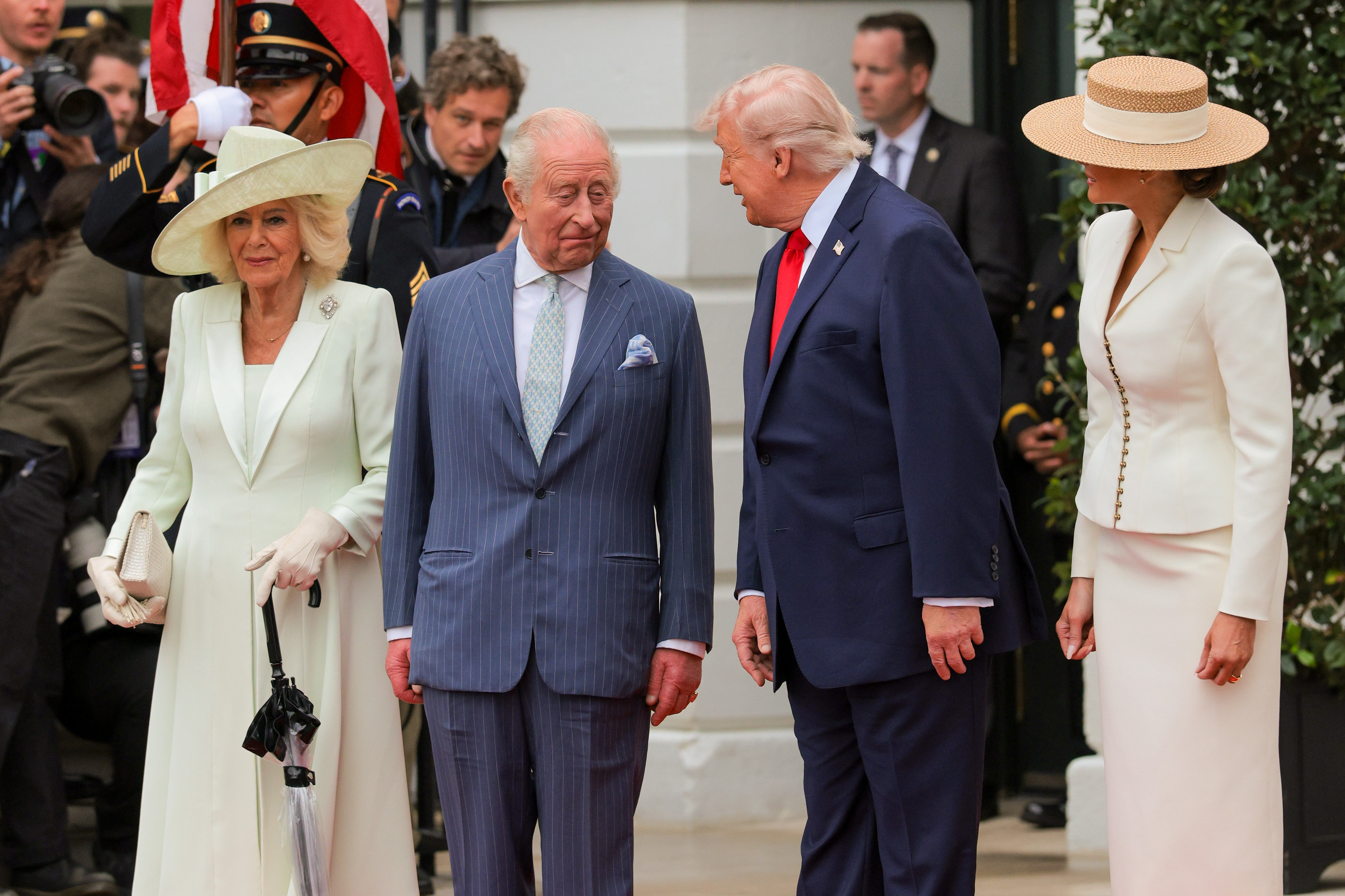 Queen Camilla, King Charles III, Donald Trump, and Melania Trump pose at the State Arrival Ceremony on the White House South Lawn, April 28, 2026. | Source: Getty Images