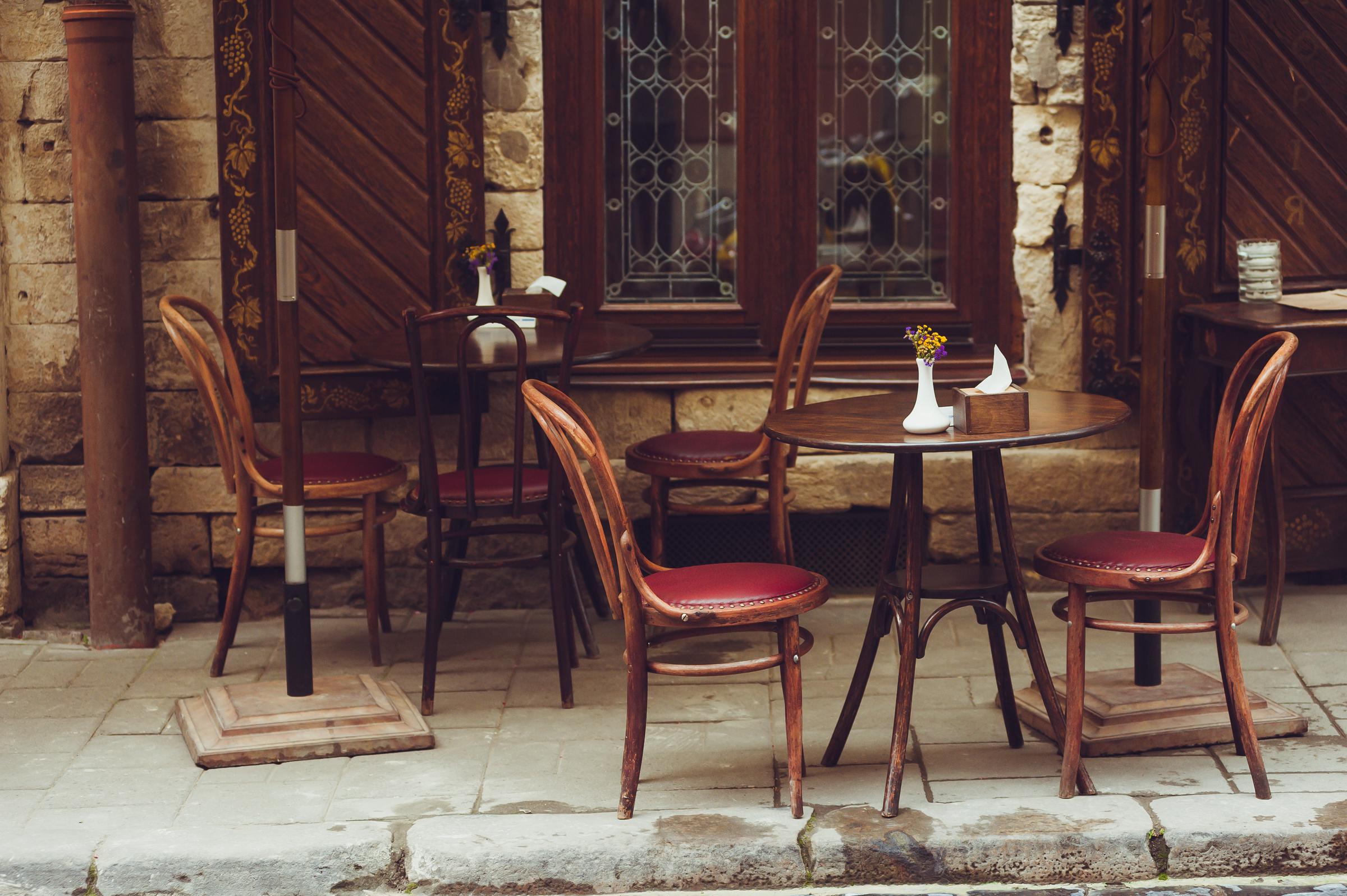 A cozy café in the center of an old town | Source: Shutterstock