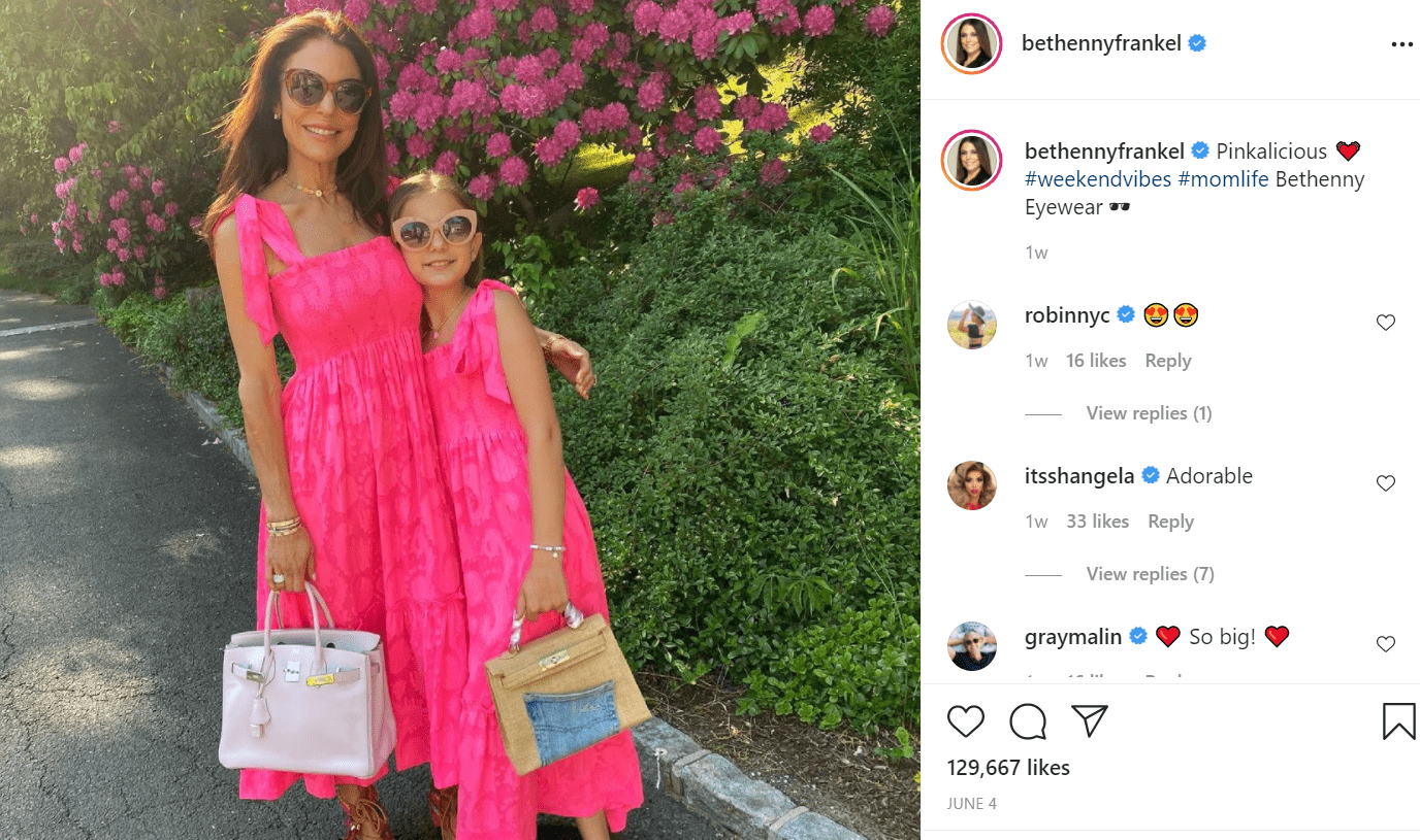 Pictured - Bethenny Frankel twinning with her daughter Brynx in long pink flowy dresses and shades | Source: Instagram/@bethennyfrankel
