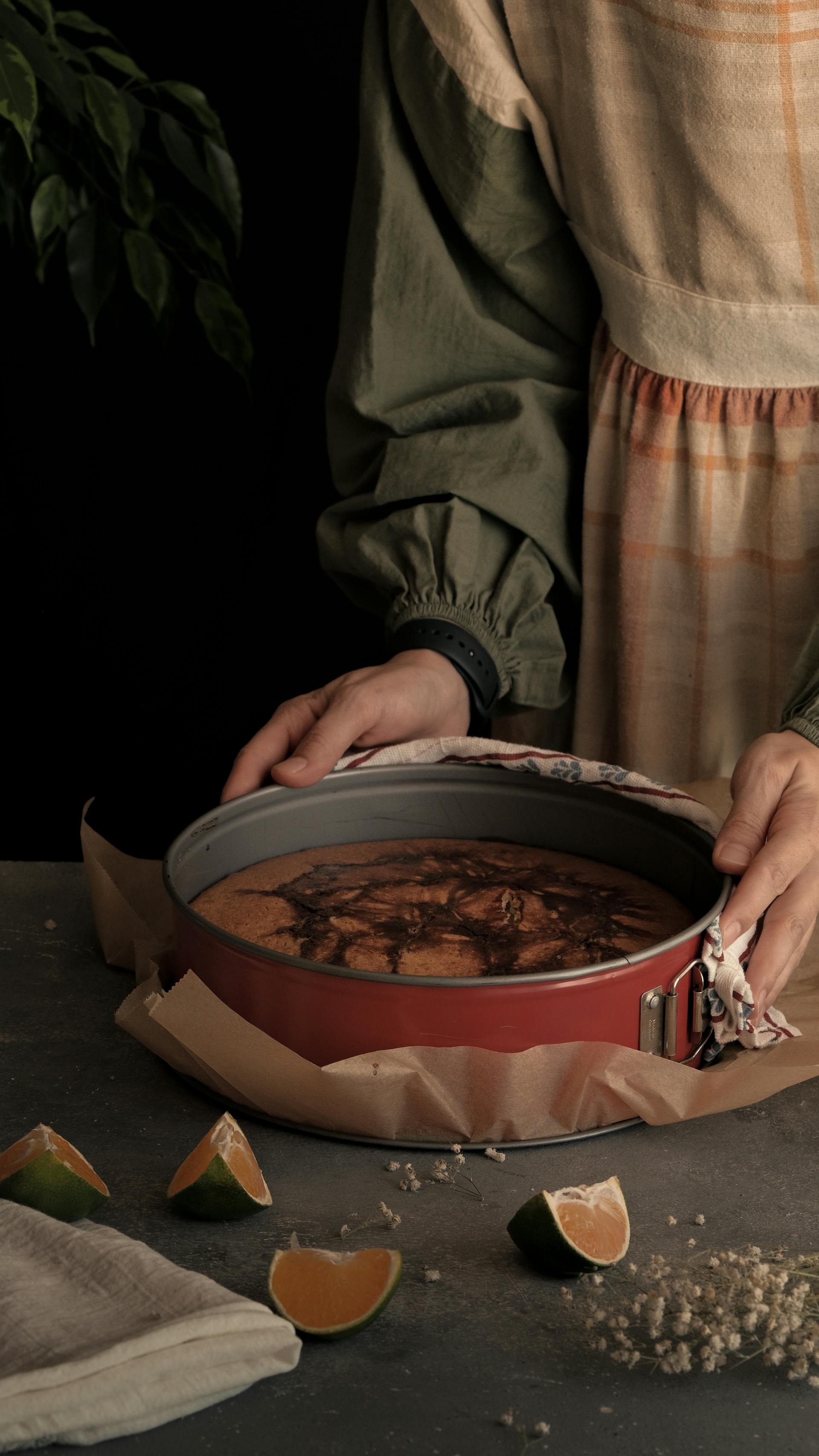 A close-up of a woman preparing a cake | Source: Pexels