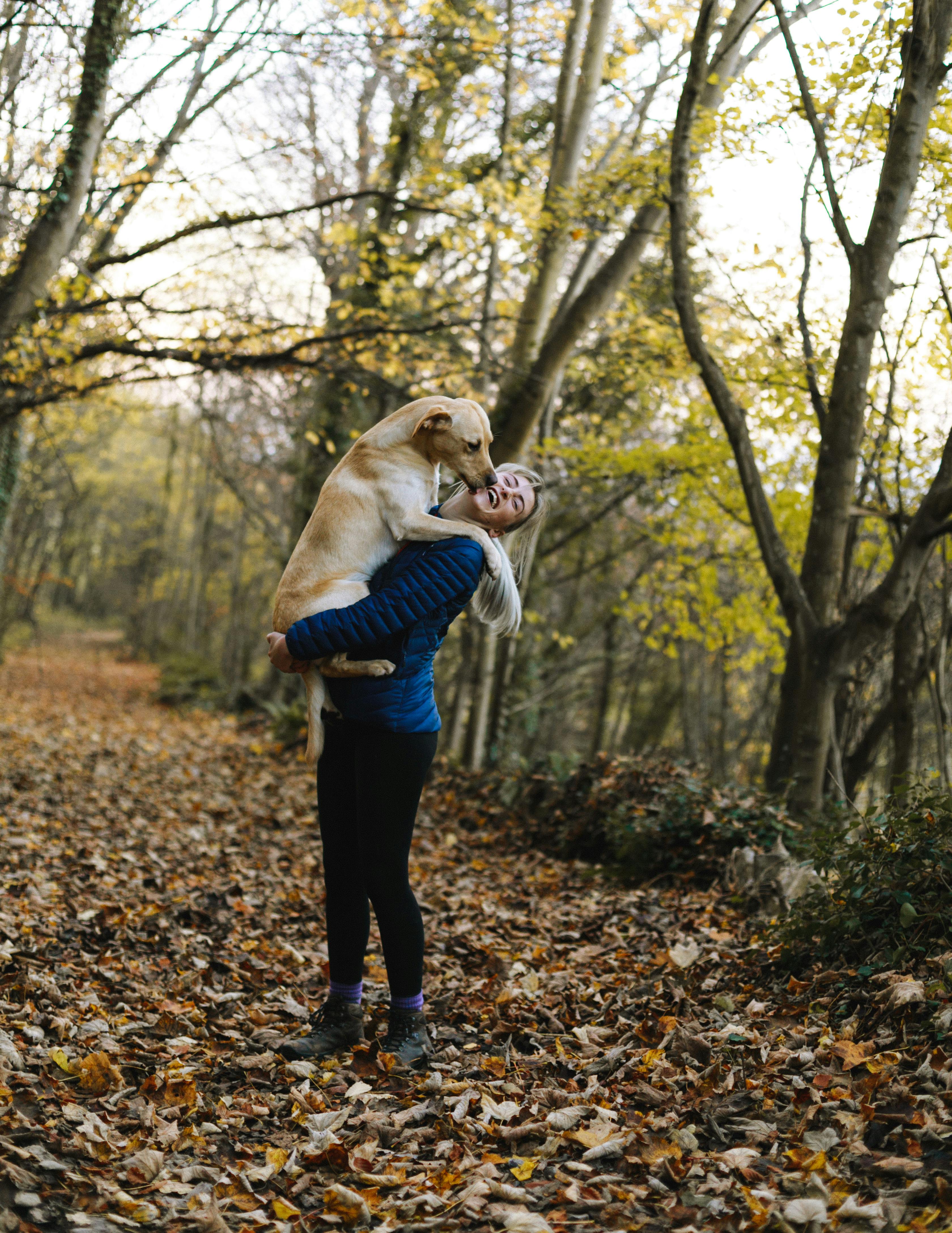 A woman with her dog | Source: Pexels