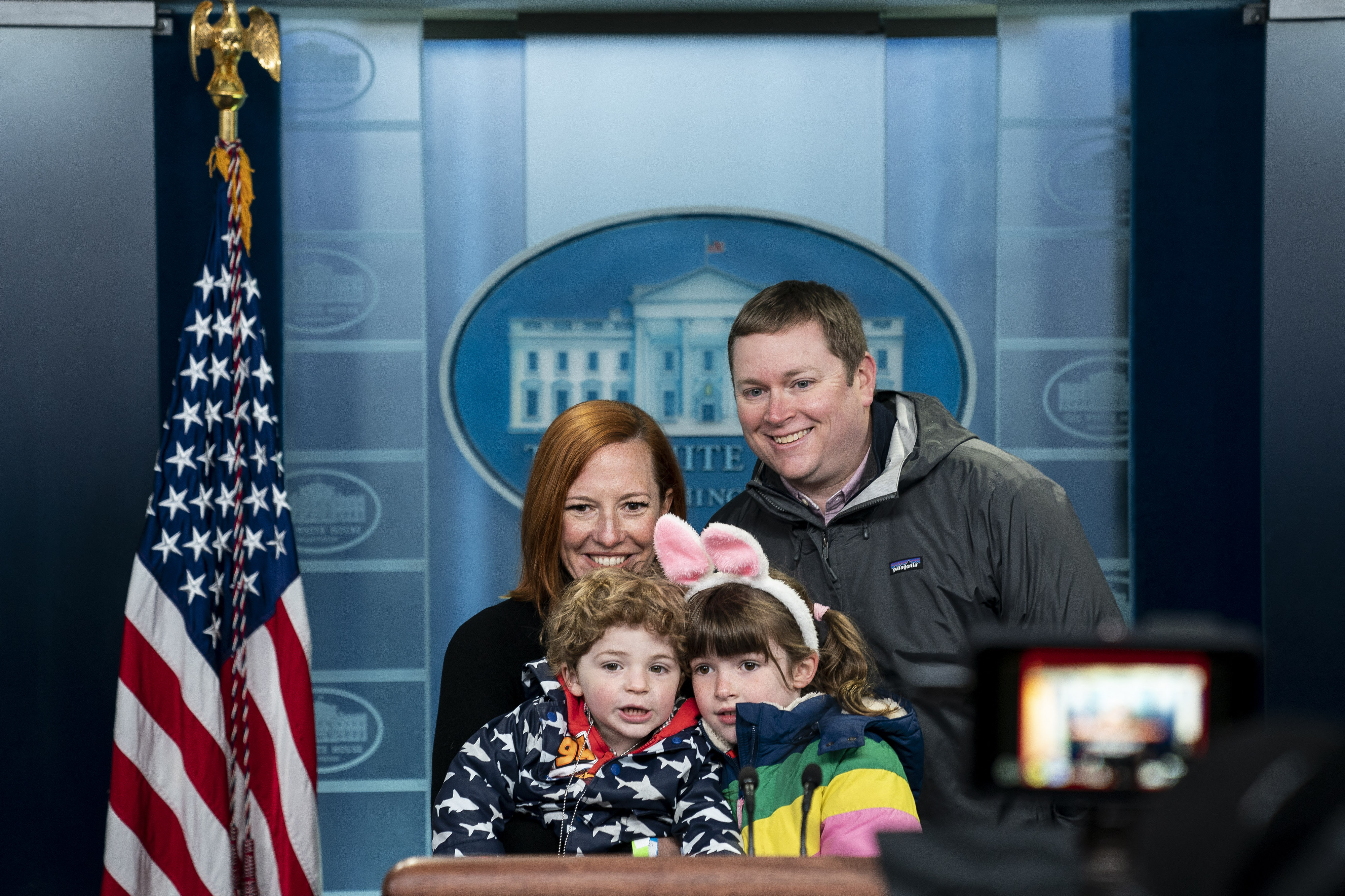 Jen Psaki with her family in the James S Brady Press Briefing Room of the White House in Washington, DC, in April 2022. | Source: Getty Images
