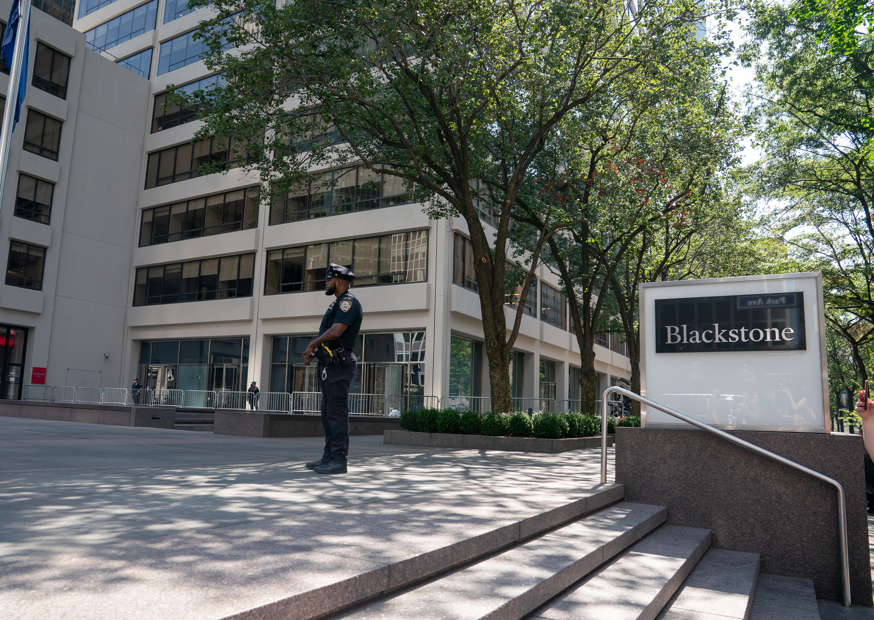 Police officer stands outside Blackstone HQ at 345 Park Avenue on July 29, 2025. | Source: Getty Images
