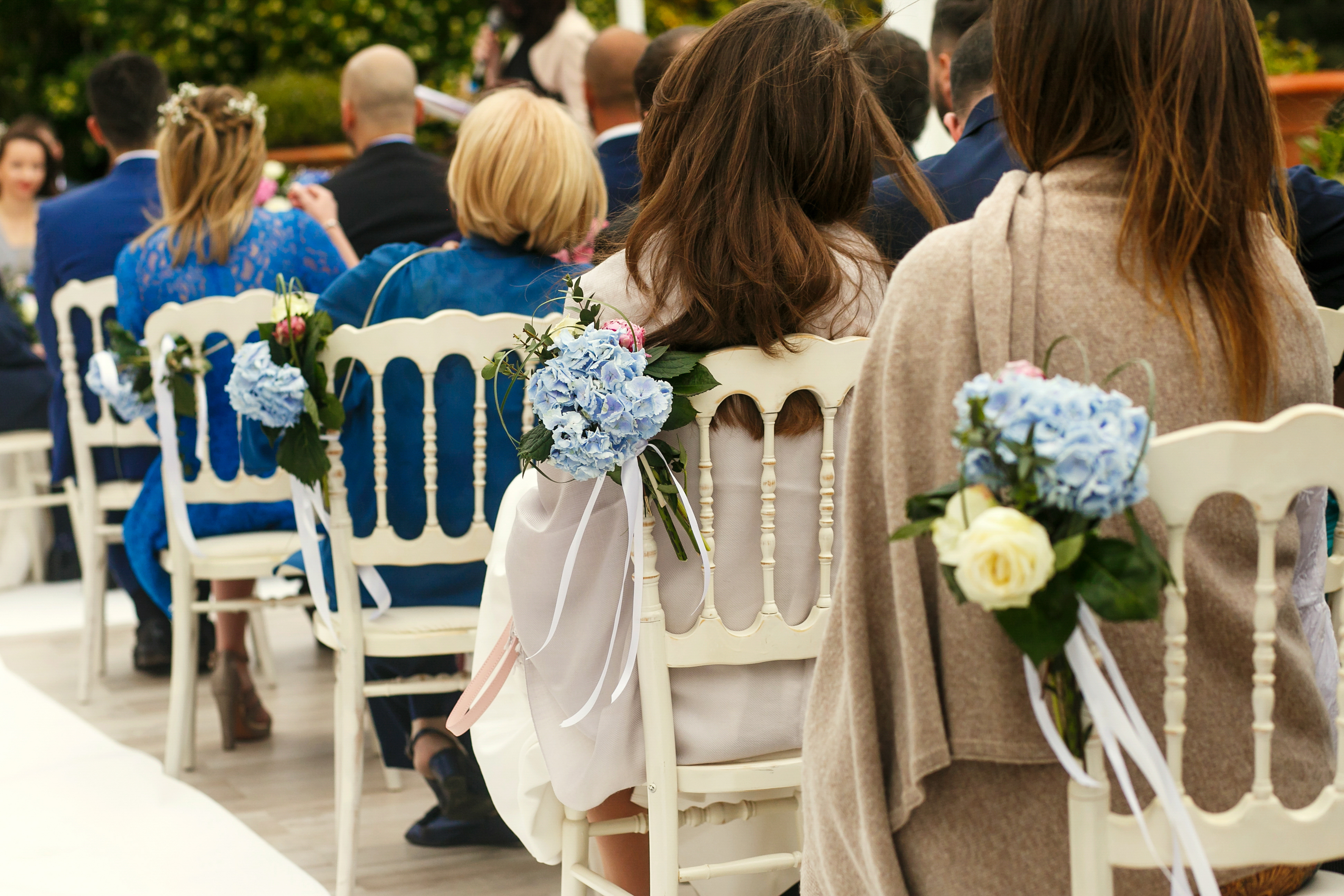Guests seated during a wedding ceremony | Source: Shutterstock