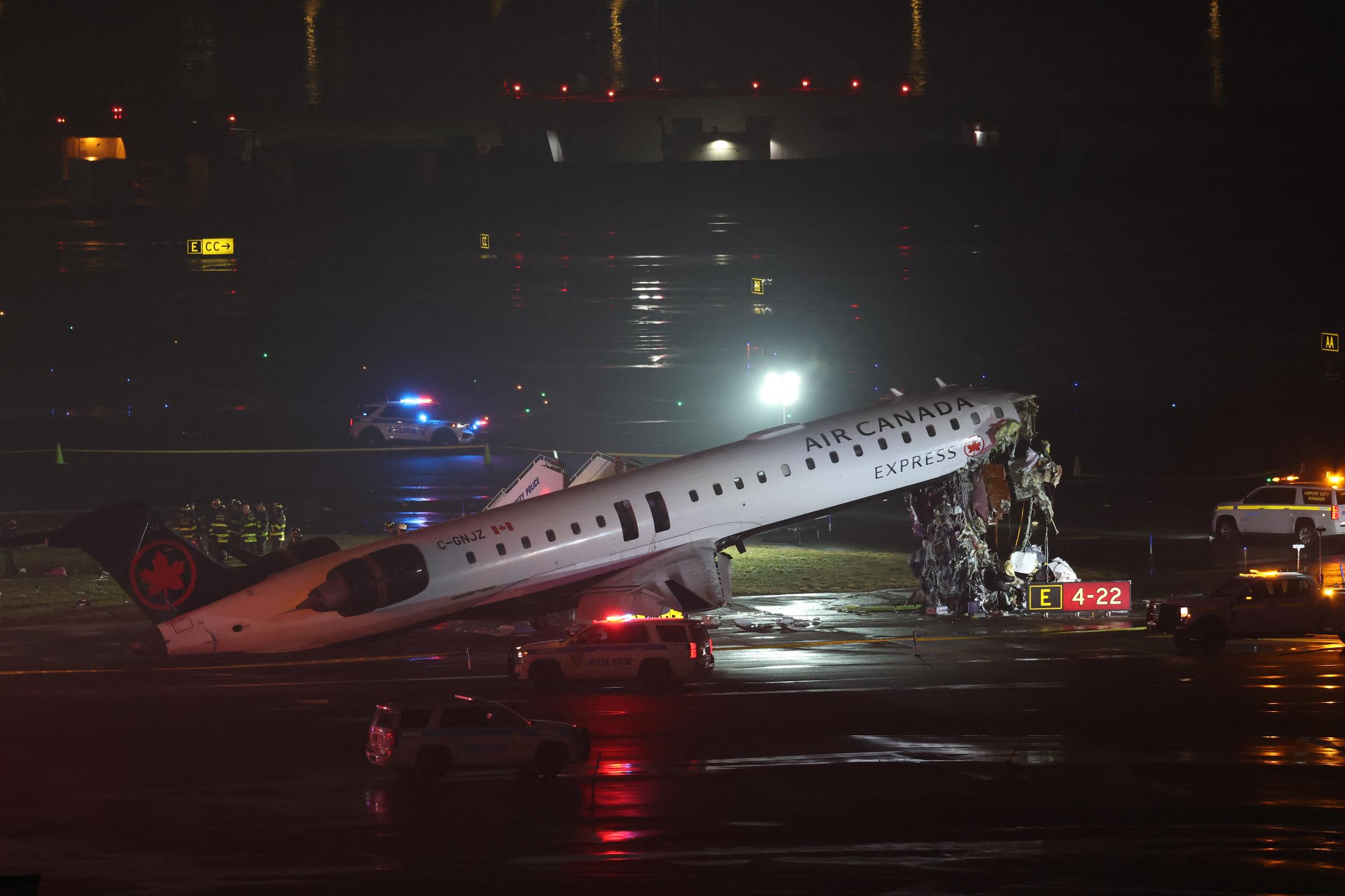 An Air Canada Express plane sits on the runway after colliding with a fire truck at LaGuardia Airport in New York on March 23, 2026 | Source: Getty Images