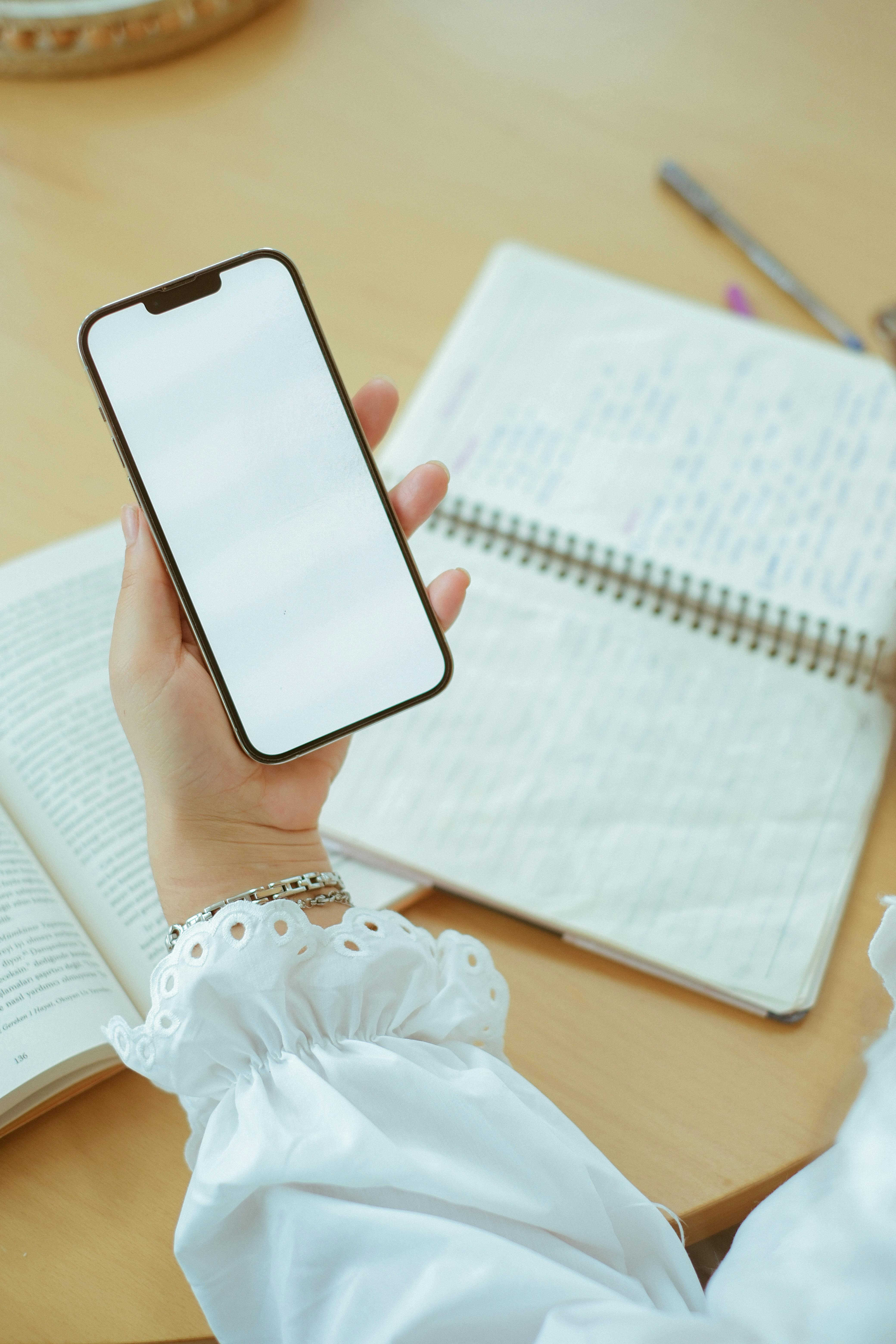 A woman looking into her phone | Source: Pexels