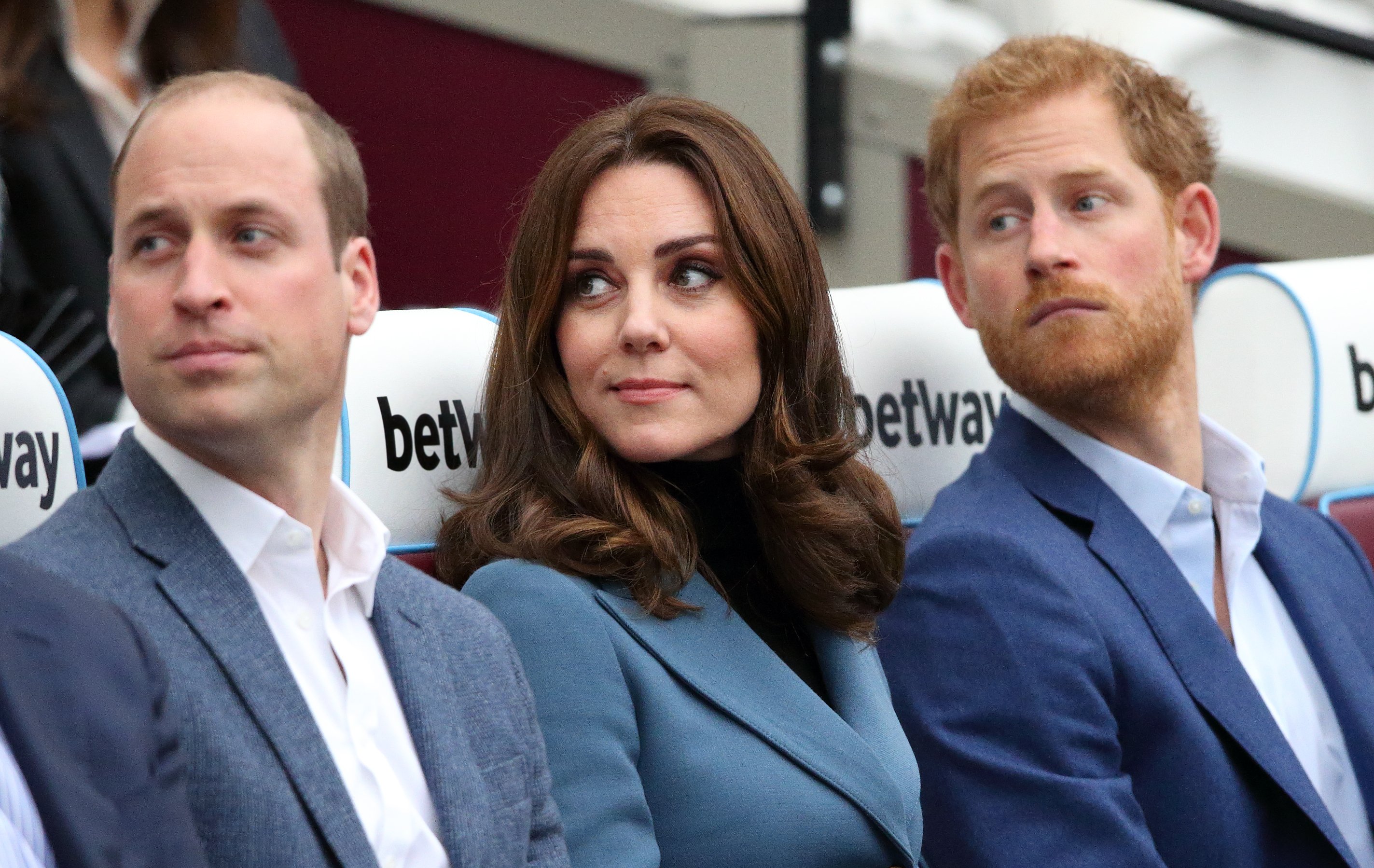 Prince William, Kate Middleton and Prince Harry during the Coach Core graduation ceremony at The London Stadium on October 18, 2017 in London, England. | Source: Getty Images
