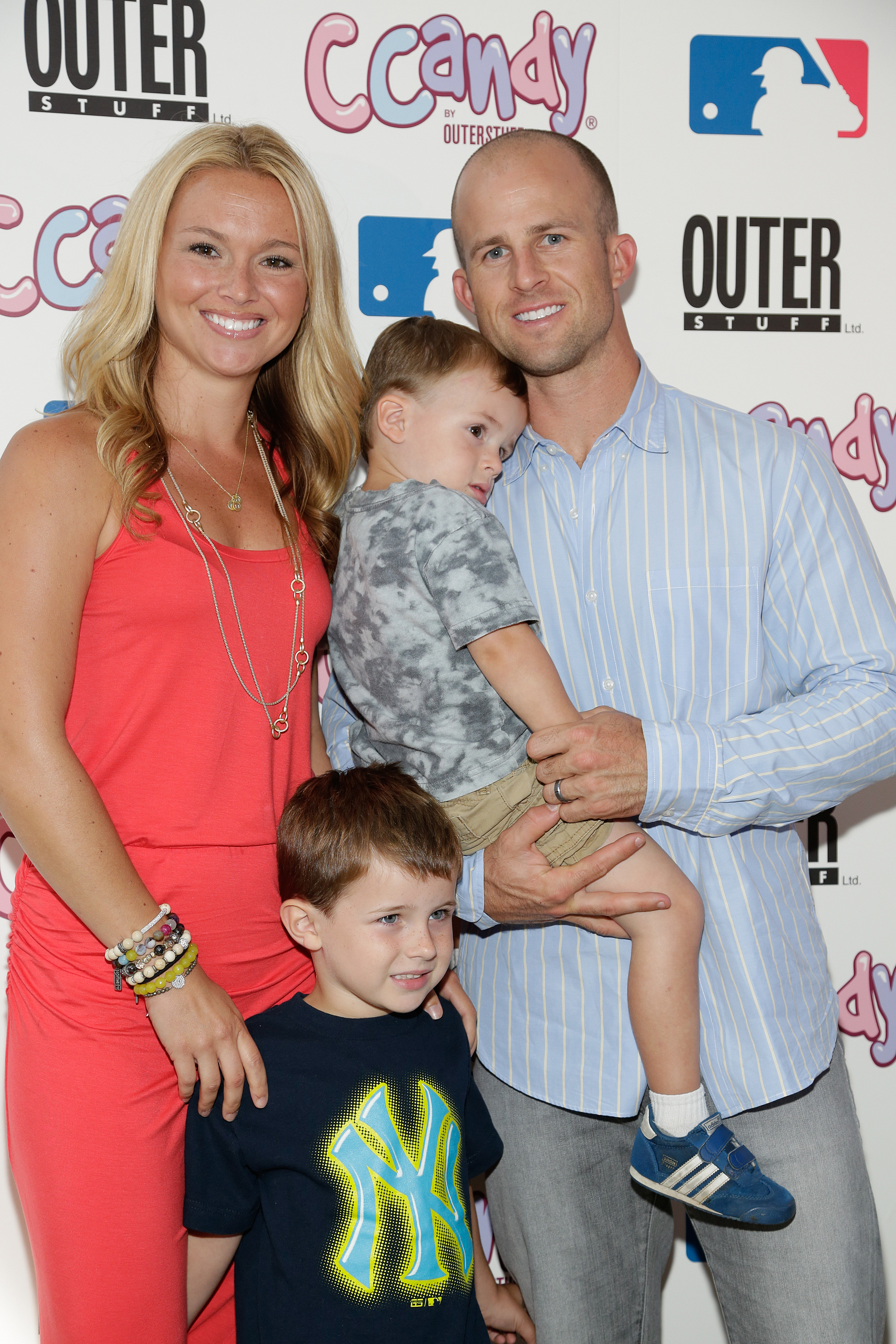 New York Yankee Brett Gardner, his wife Jessica, and sons attend the CCandy Children's Clothing Line Launch at MLB Fan Cave on August 8, 2013, in New York City | Source: Getty Images