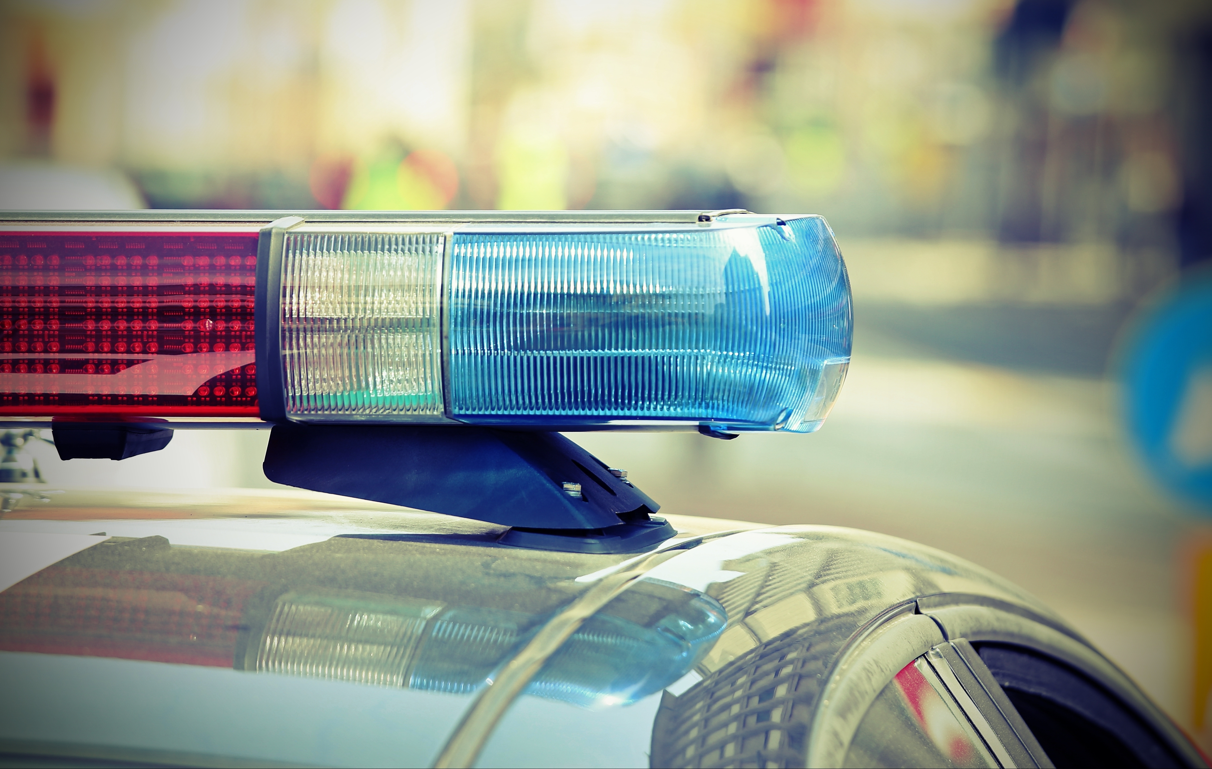 Flashing lights of the police car | Source: Shutterstock