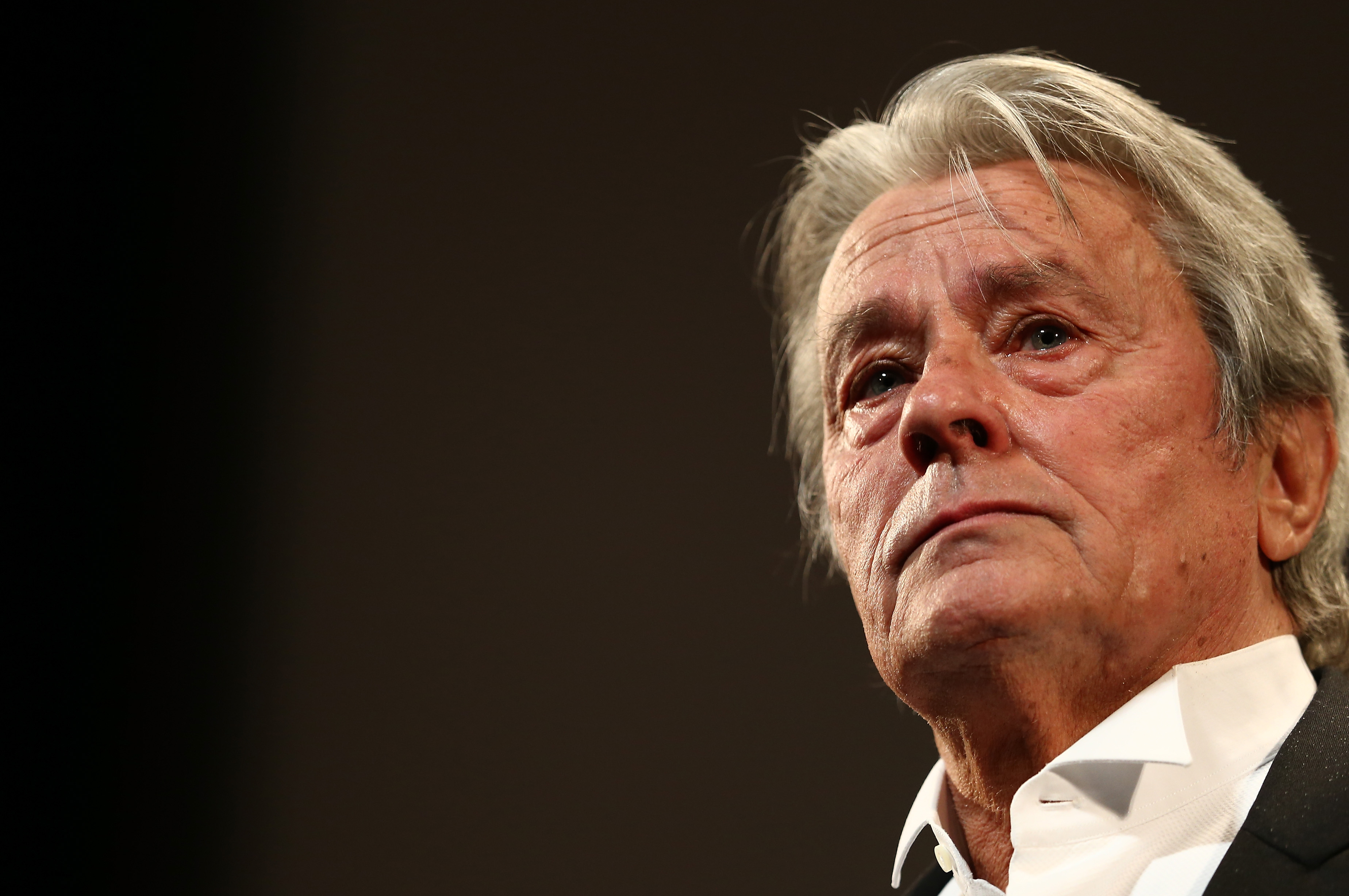 Alain Delon appears on stage during a Tribute To Alain Delon during The 66th Annual Cannes Film Festival in Cannes, France, on May 25, 2013 | Source: Getty Images