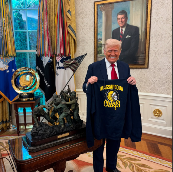 Donald Trump poses with a sweater, dated April 2025 | Source: Instagram/therealdonaldtrump
