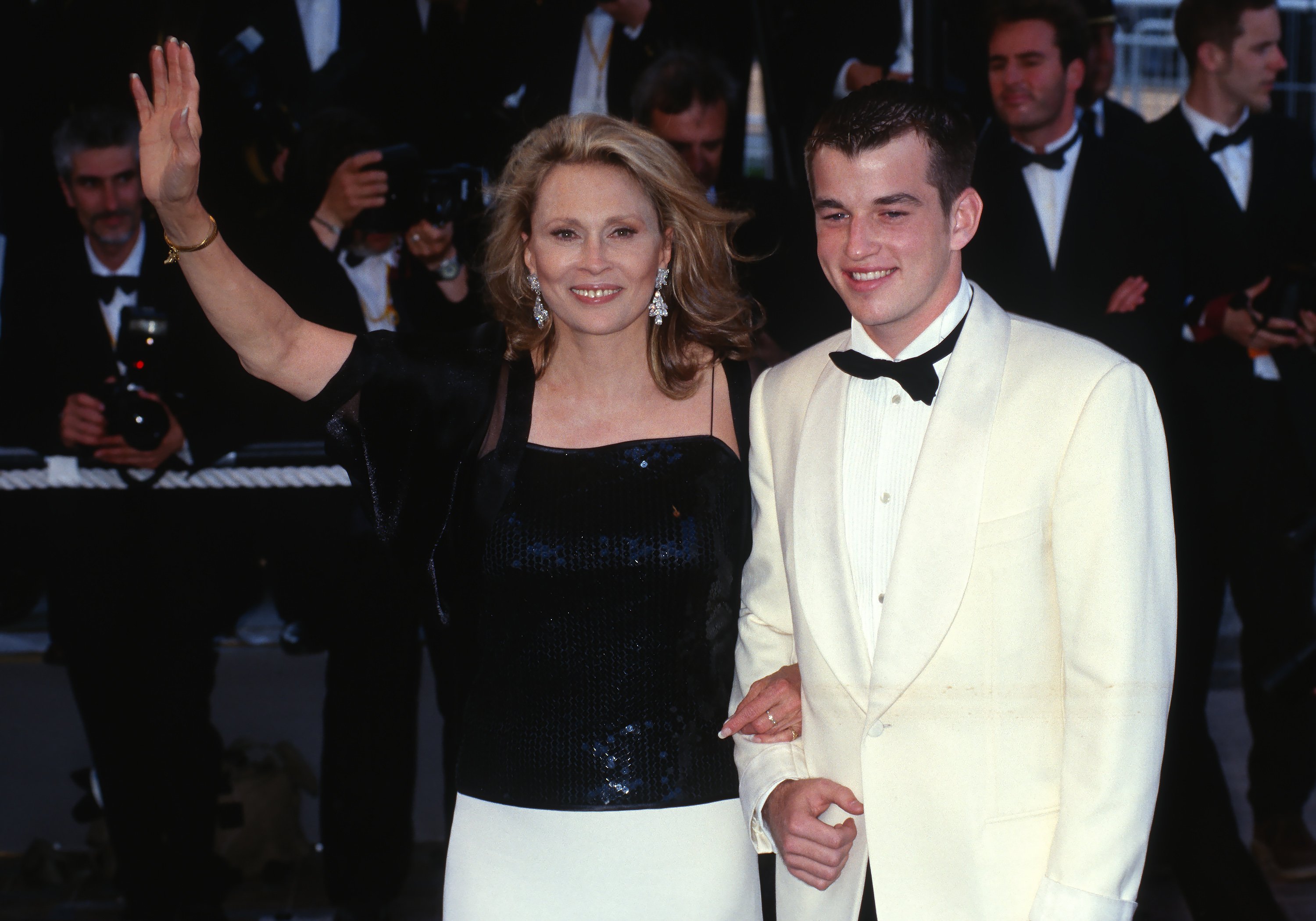 Faye Dunaway and her son Liam O'Neil attend the 52th Cannes Film Festival, 1999, Cannes, France. | Photo: Getty Images