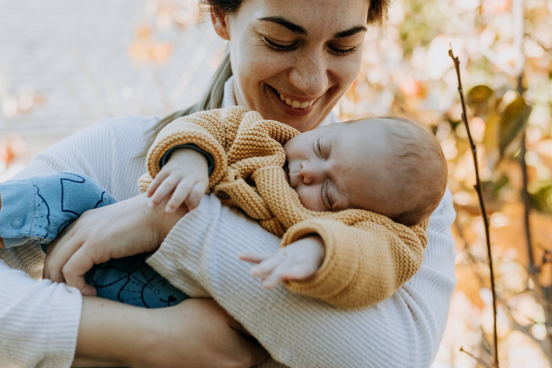 A woman smiling at her baby | Source: Pexels