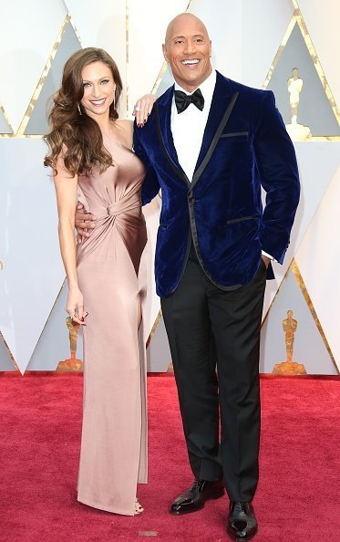 Actor Dwayne Johnson (R) and Lauren Hashian arrive at the 89th Annual Academy Awards at Hollywood & Highland Center on February 26, 2017 in Hollywood, California | Photo: Getty Images