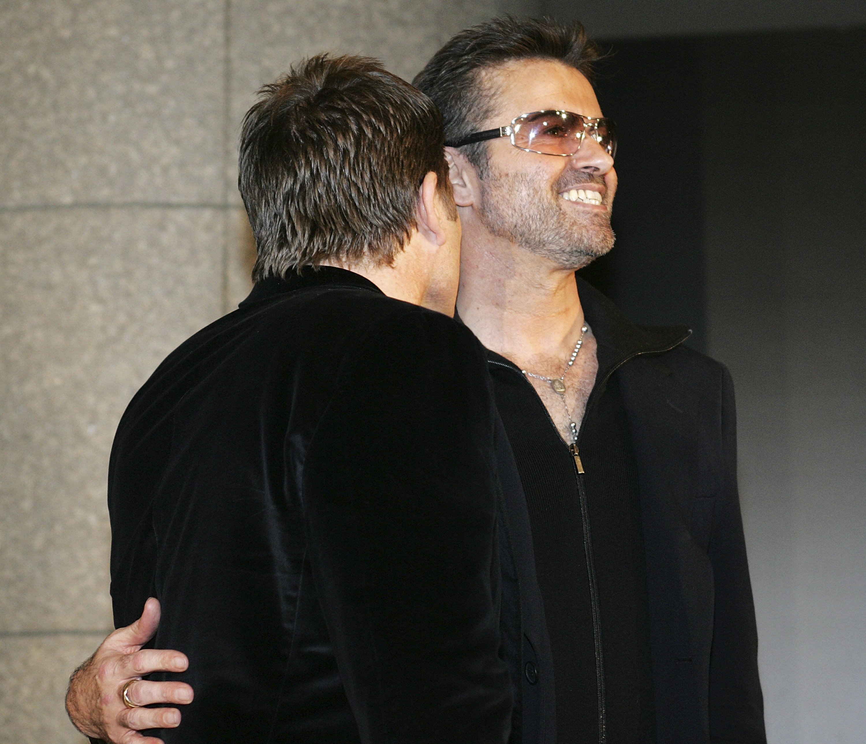 George Michael and Kenny Goss at the the Japanese Premiere of his film "A Different Story" on December 15, 2005 in Tokyo, Japan.  | Source: Getty Images