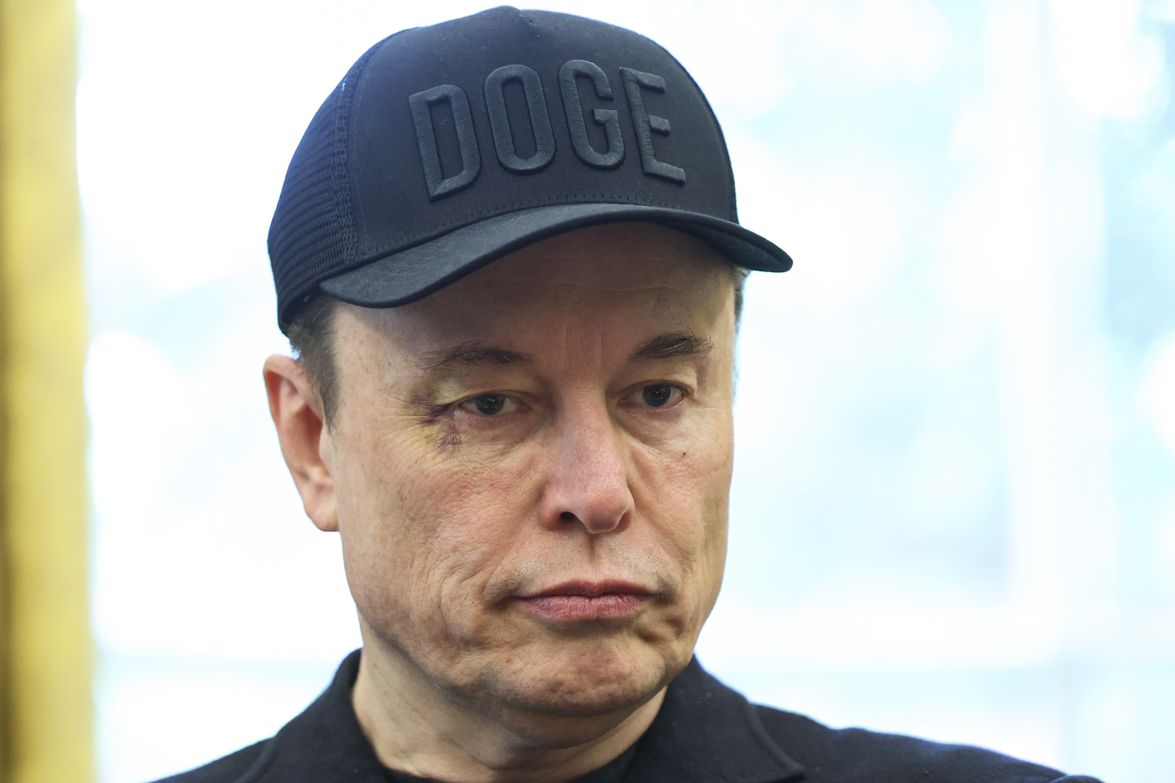 Musk didn't appear bothered by the attention, staying composed throughout the press event.