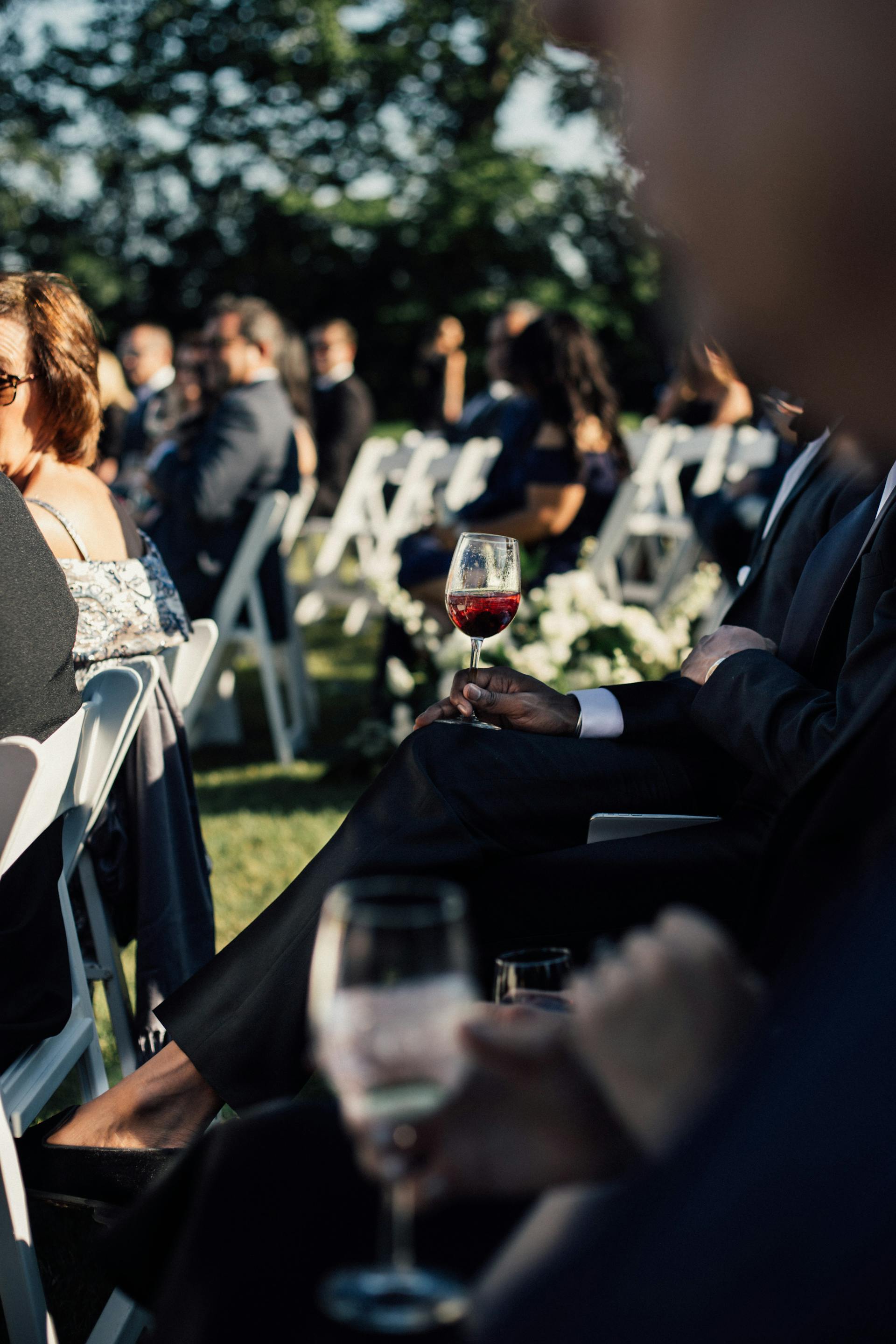 People sitting at a wedding ceremony | Source: Pexels