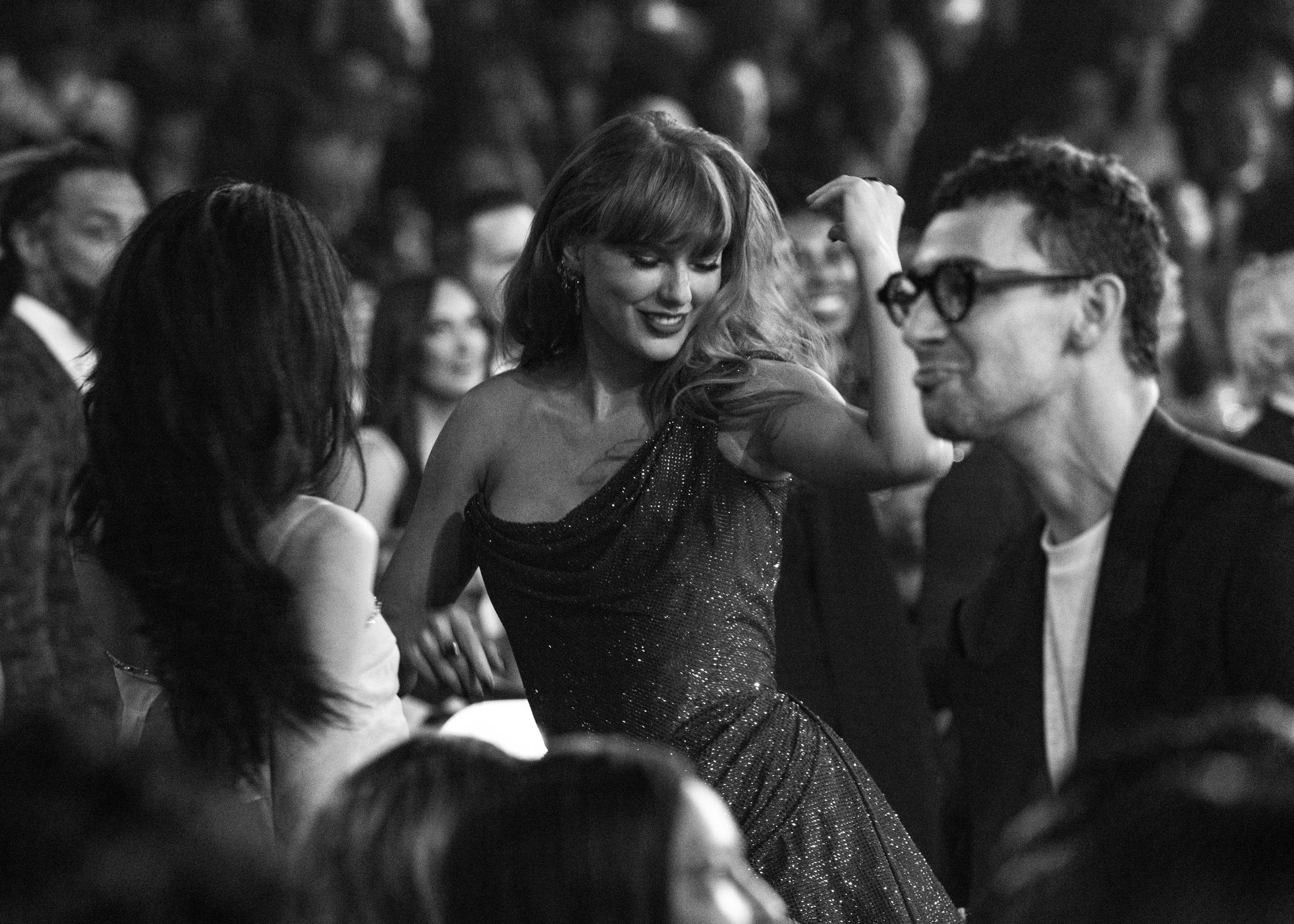 Taylor Swift dancing at the 67th Annual Grammy Awards | Source: Getty Images