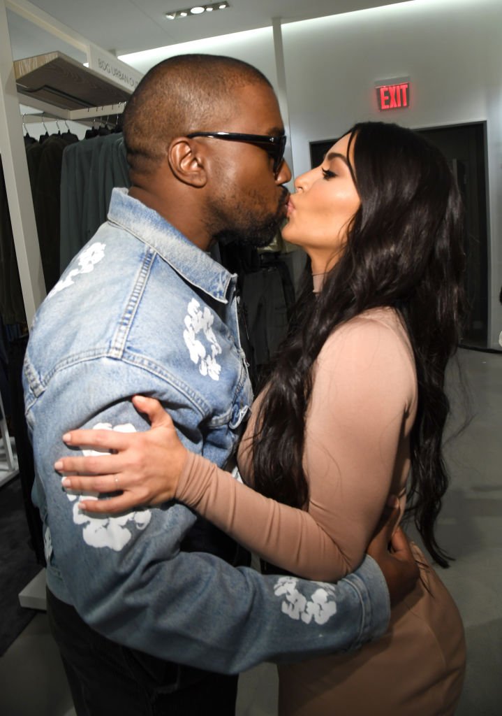 Kanye West and Kim Kardashian West share a kiss as they celebrate the launch of SKIMS at Nordstrom NYC on February 05, 2020 in New York City. | Photo: Getty Images