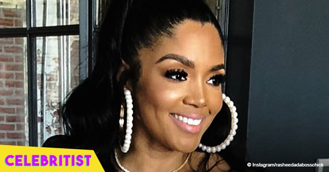 Rasheeda Frost turns heads in pink mini dress & heels, showing her nude bra in new photo