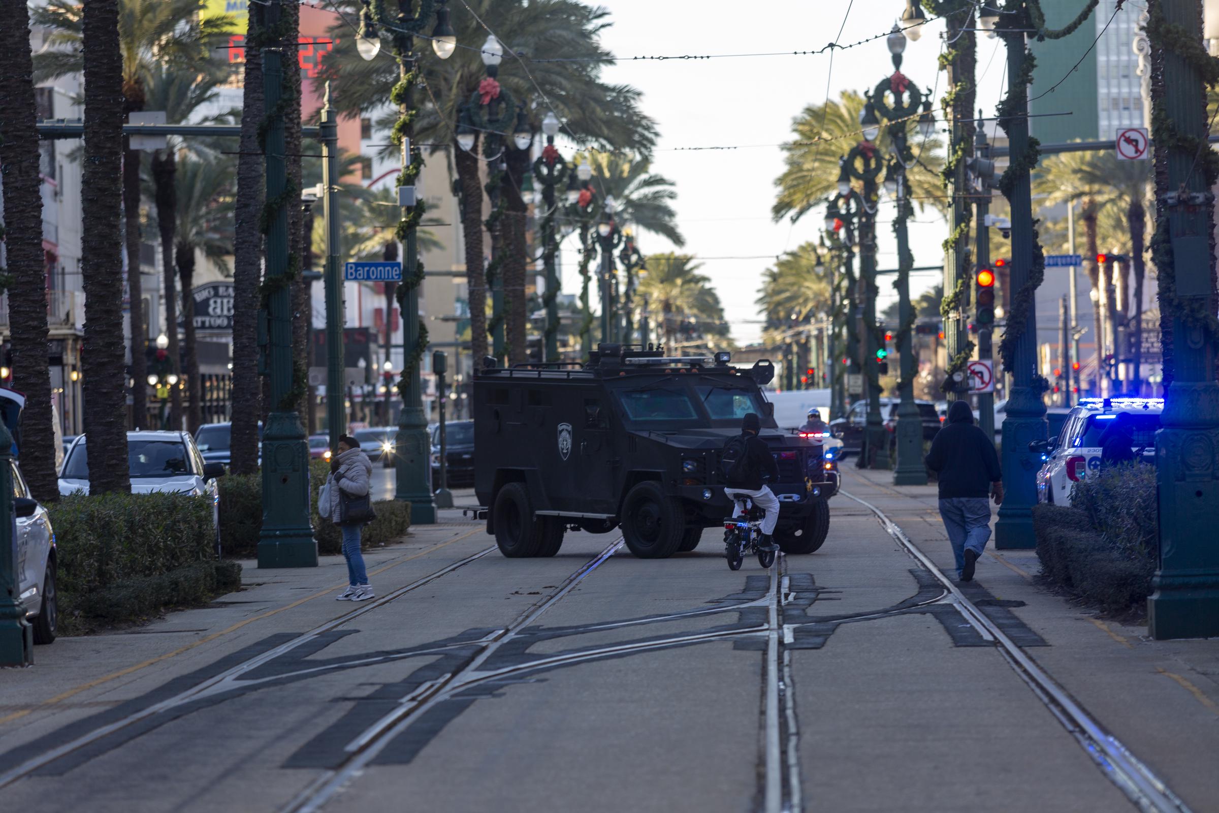 A police and motorcade blockade clearing the way for former President Joe Biden to visit the Bourbon Street shrine in New Orleans, Louisiana on January 6, 2025. | Source: Getty Images