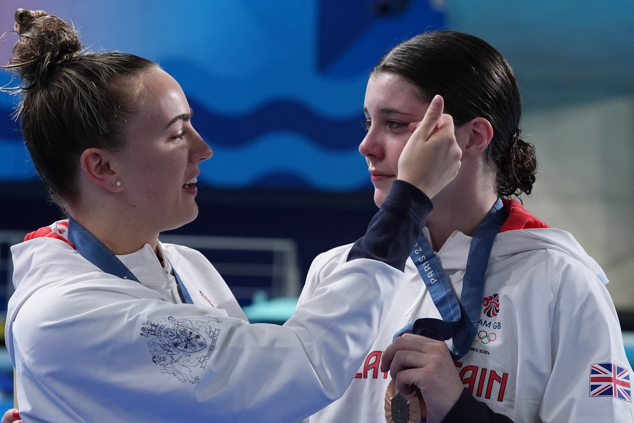 Andrea Spendolini-Sirieix (R) and Lois Toulson (L) of Great Britain celebrate the bronze medal after competing Women's Synchronized 10M Platform Final on day five of the Olympic Games Paris 2024 at Aquatics Centre 31 July in Paris, France. | Source: Getty Images