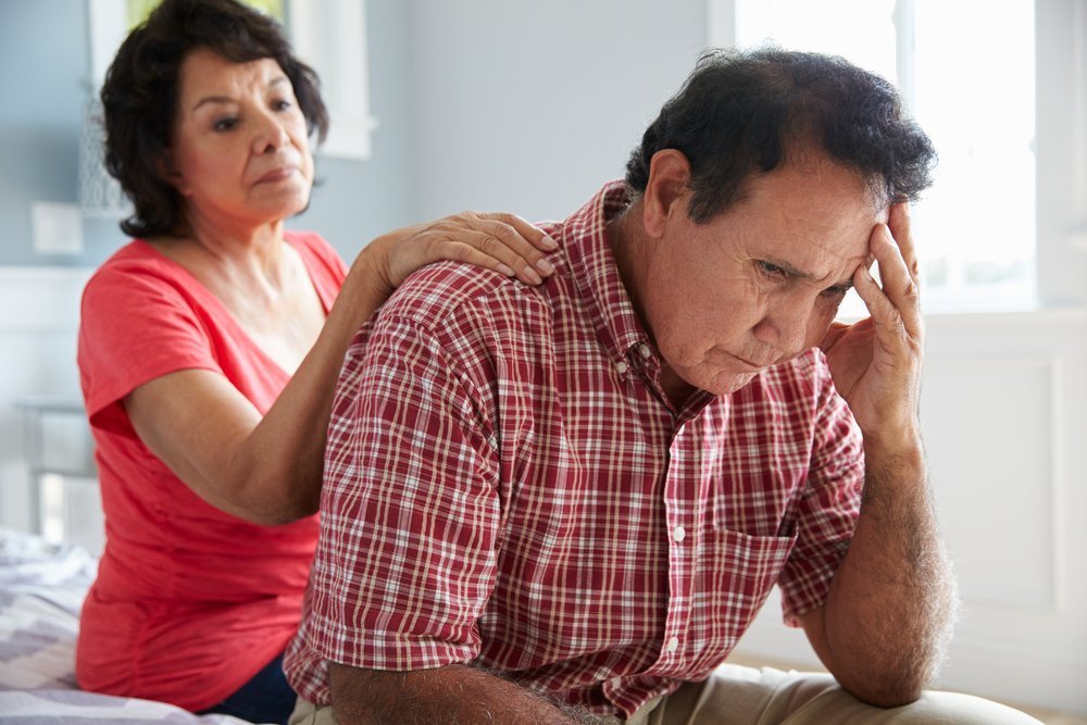 Wife Comforting Senior Husband Suffering With Dementia | Photo: Shutterstock