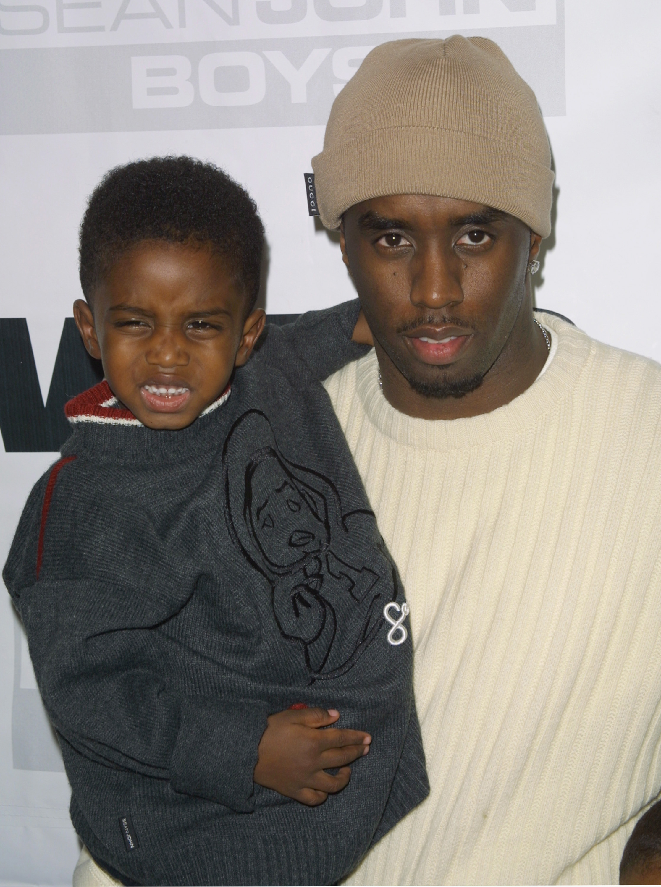 Christian and Diddy Combs during Sean John Holiday Skating Party on December 5, 2001, in New York City. | Source: Getty Images
