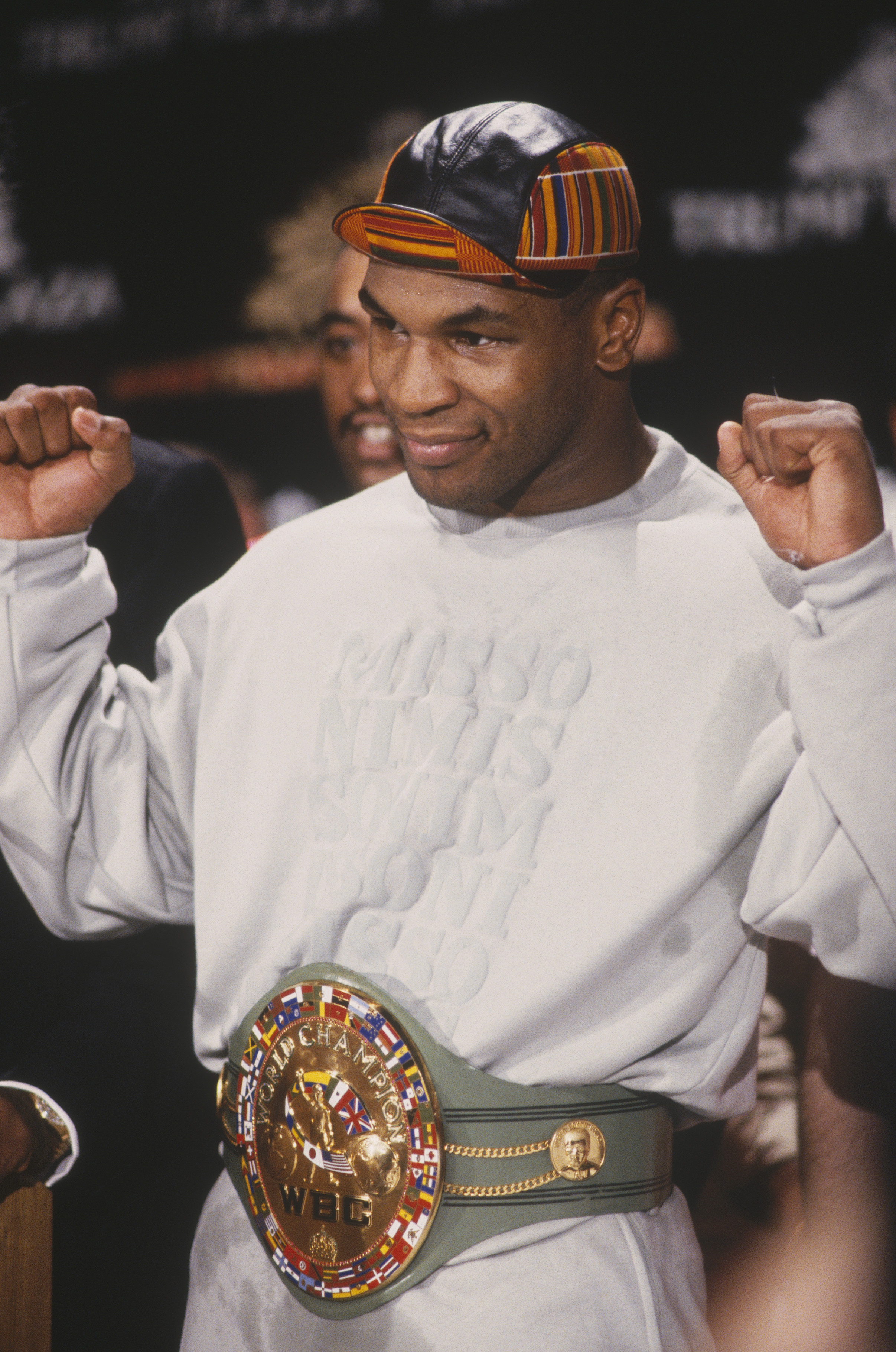 Mike Tyson posing for cameras during an undated press conference | Source: Getty Images