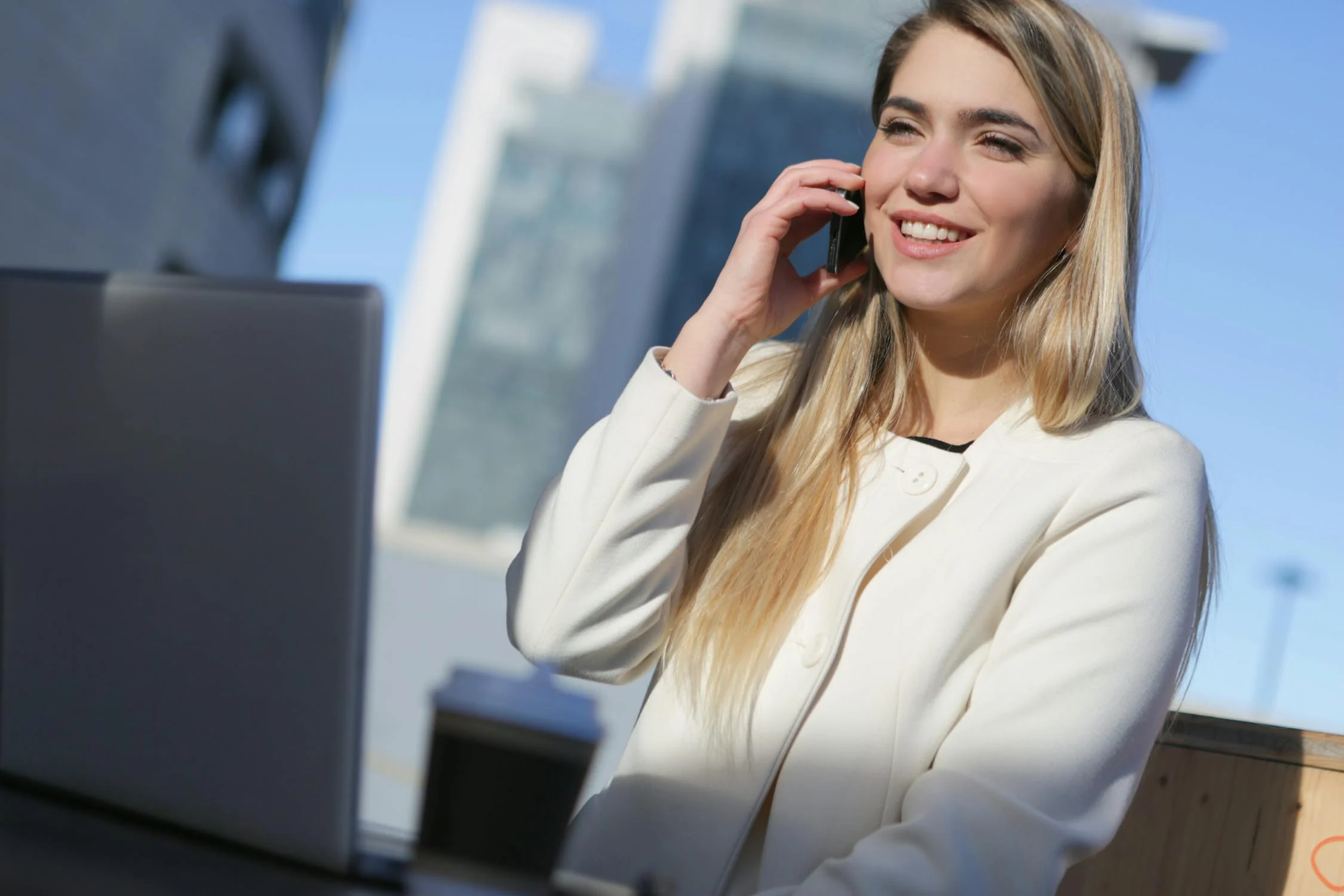 A woman talking on her phone | Source: Pexels