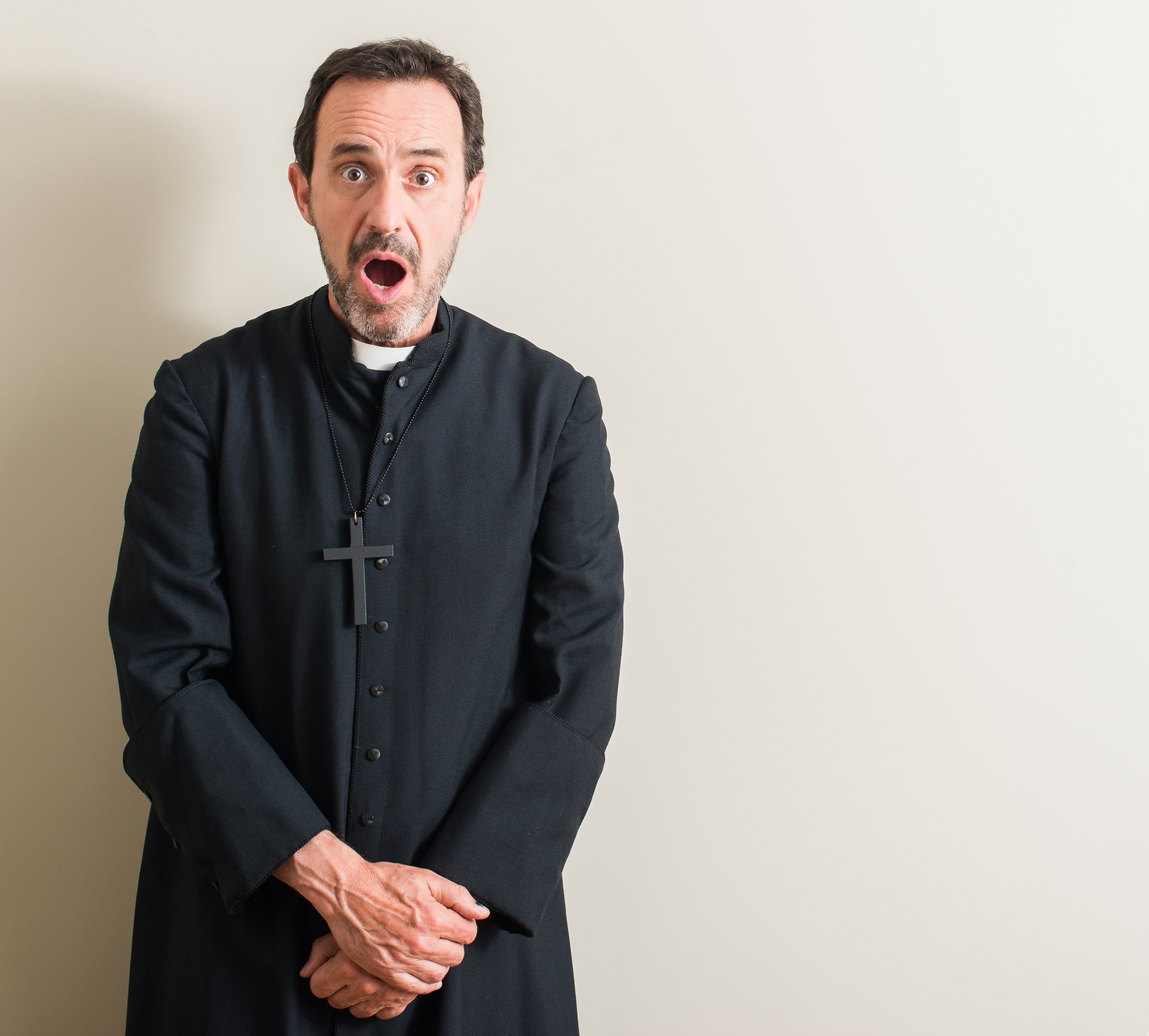 Church pastor looks shocked | Photo: Shutterstock