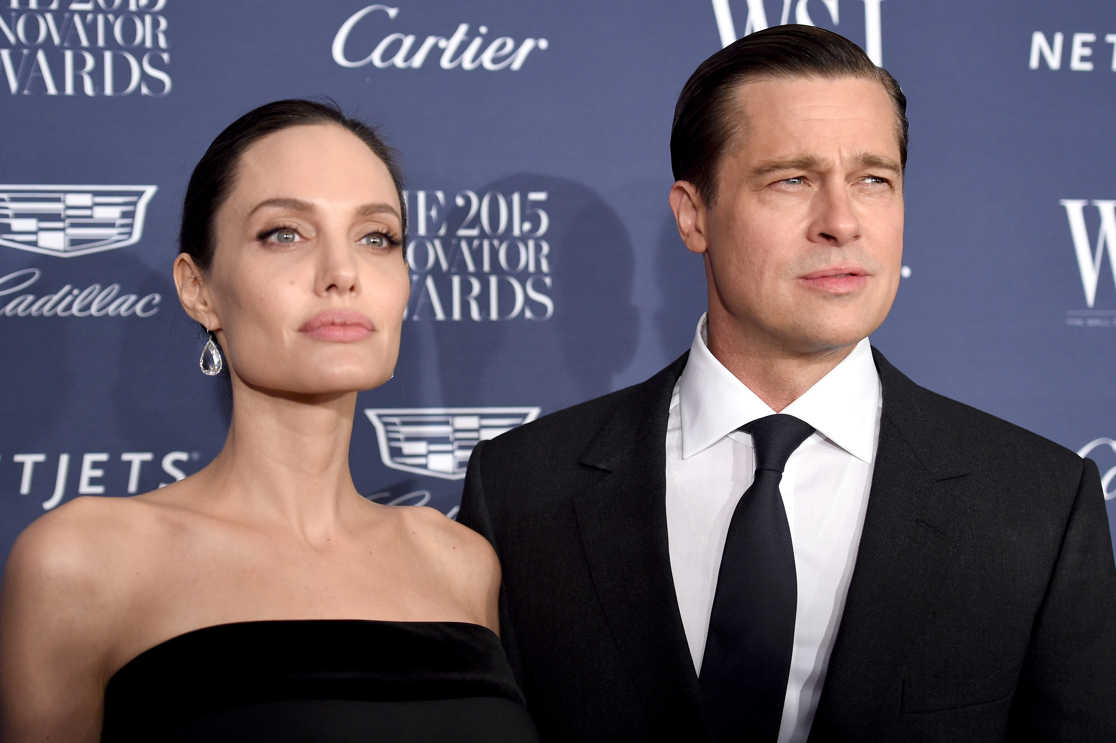 Angelina Jolie and Brad Pitt attend the WSJ Magazine Innovator Awards in New York City in 2015. Their legal disputes later included allegations over a 2016 private flight, which Pitt has denied. | Source: Getty Images