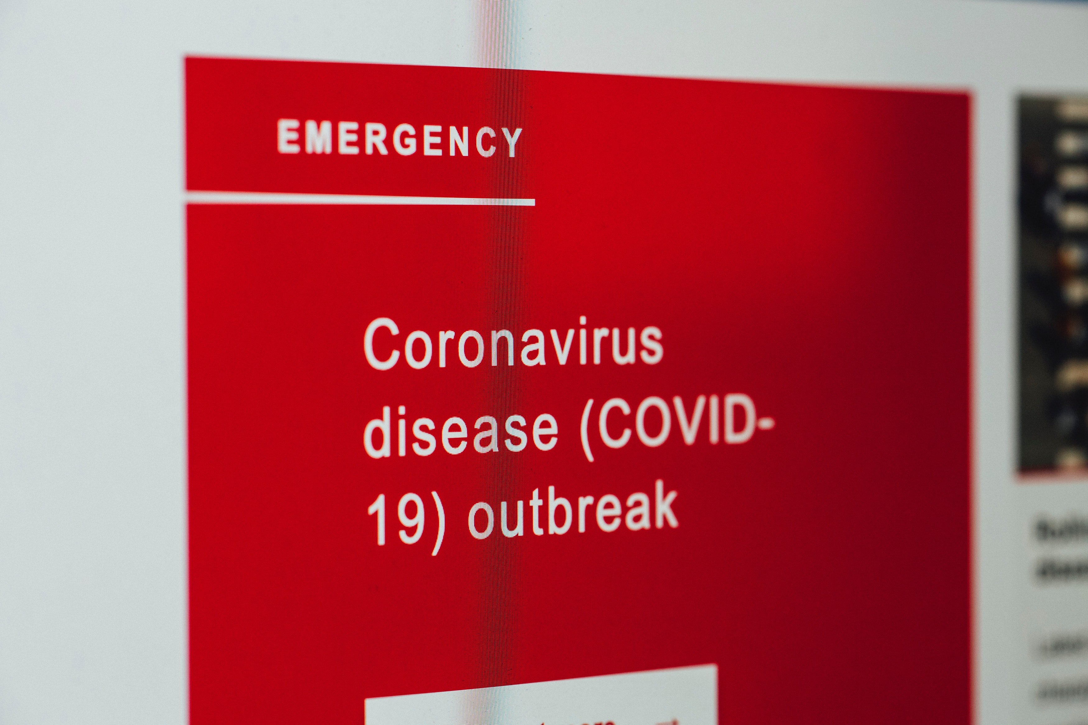 A COVID-19 emergency message card. | Source: Pexels