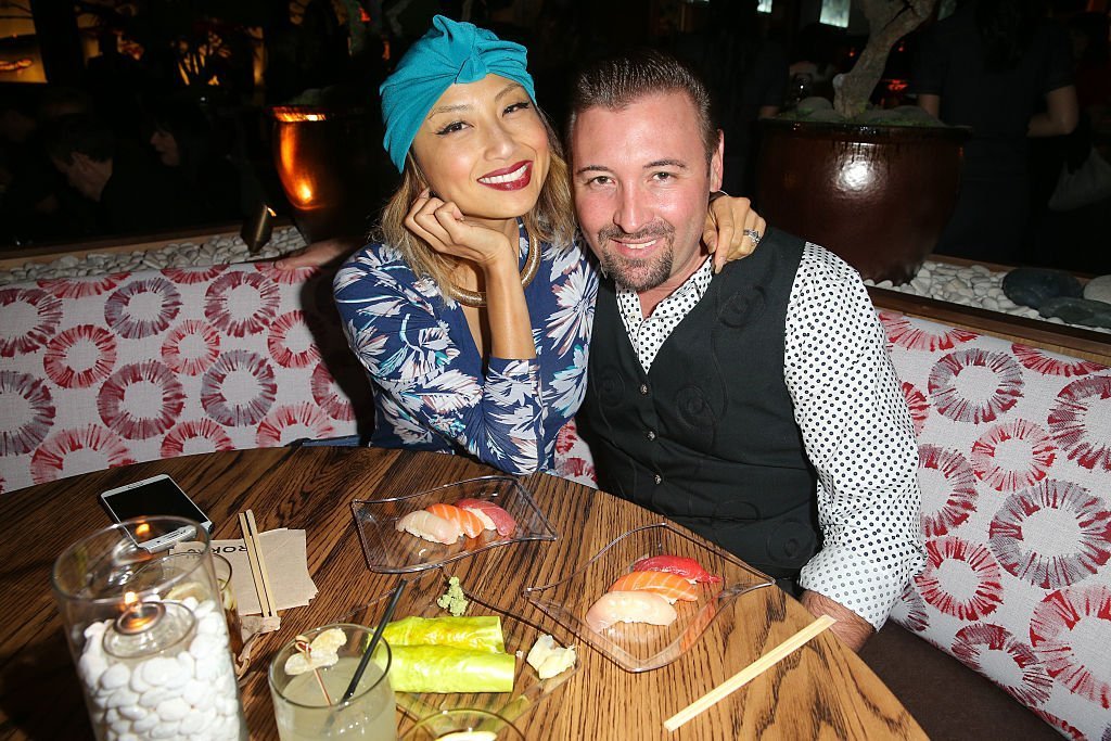 Jeannie Mai and Freddy Harteis at the grand opening of Roku on November 2015. | Photo: Getty Images