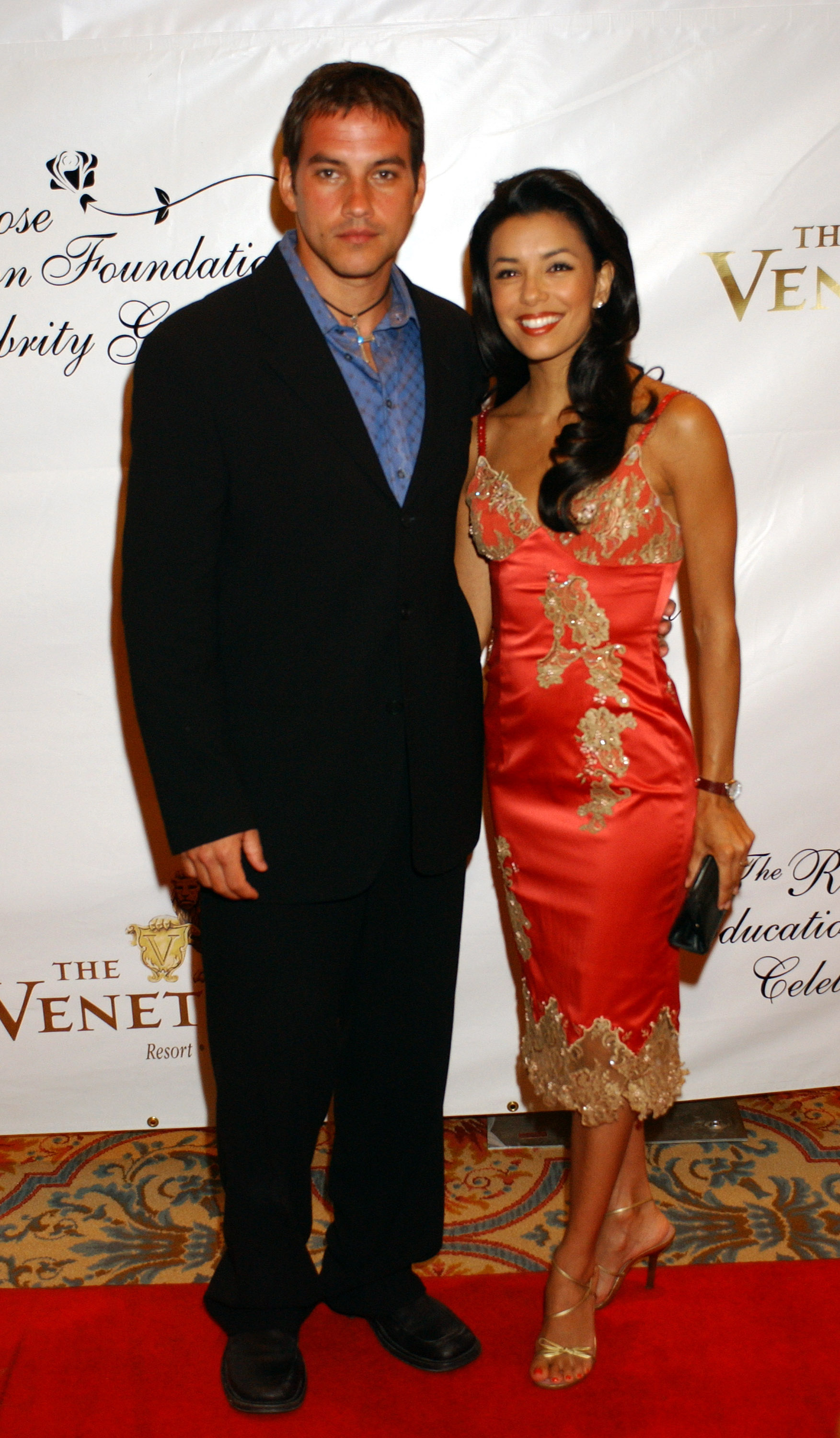 Tyler Christopher and Eva Longoria at The Rose Education Foundation's second annual gala on June 28, 2003 | Source: Getty Images
