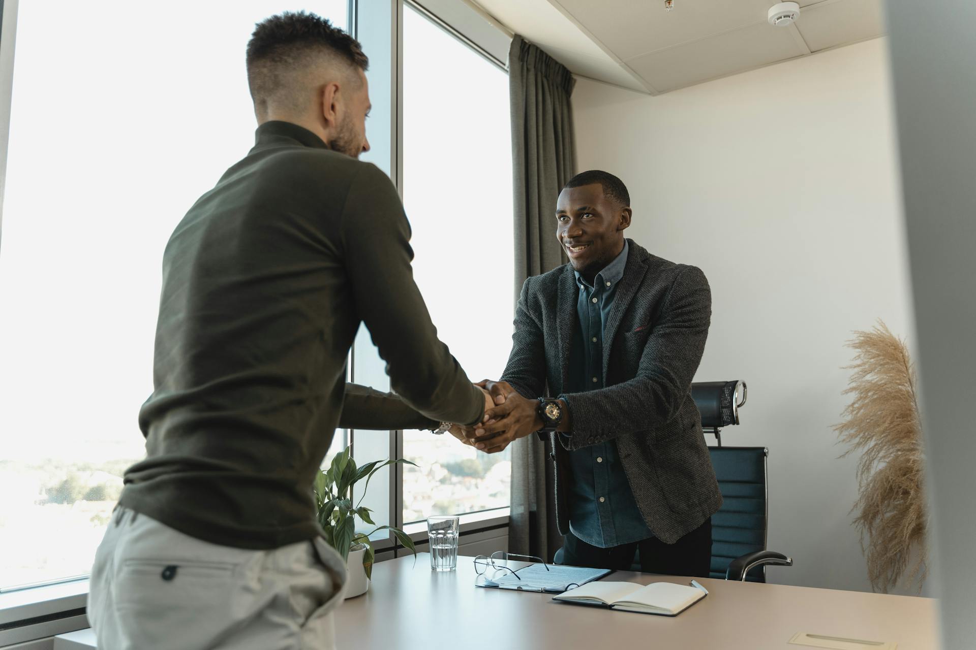 A man shaking hands with the interviewer | Source: Pexels