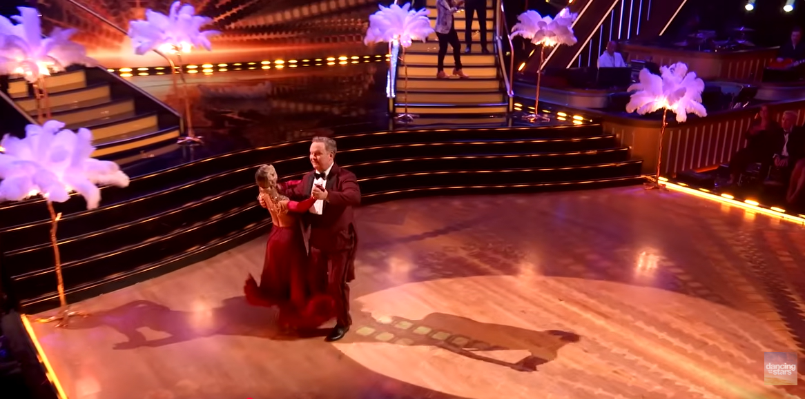 Andy Richter and Emma Slater, as seen from a video post dated November 12, 2025. | Source: YouTube/ DancingWithTheStars