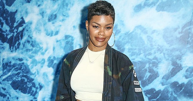 Teyana Taylor smiling as she poses for a picture | Photo: Getty Images