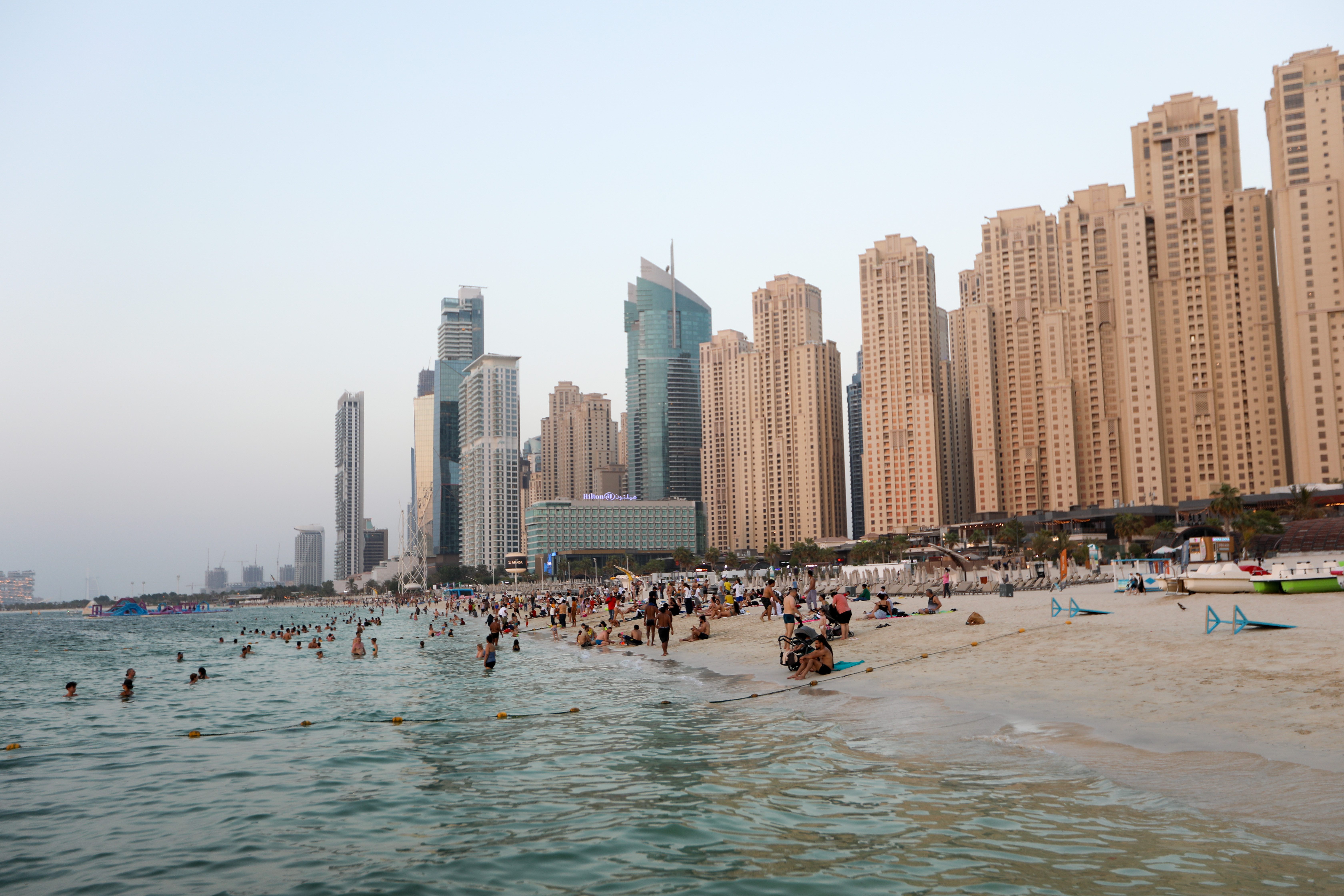 People at JBR Beach on the coast of the Persian Gulf in Dubai, United Arab Emirates on August 30, 2023 | Source: Getty Images