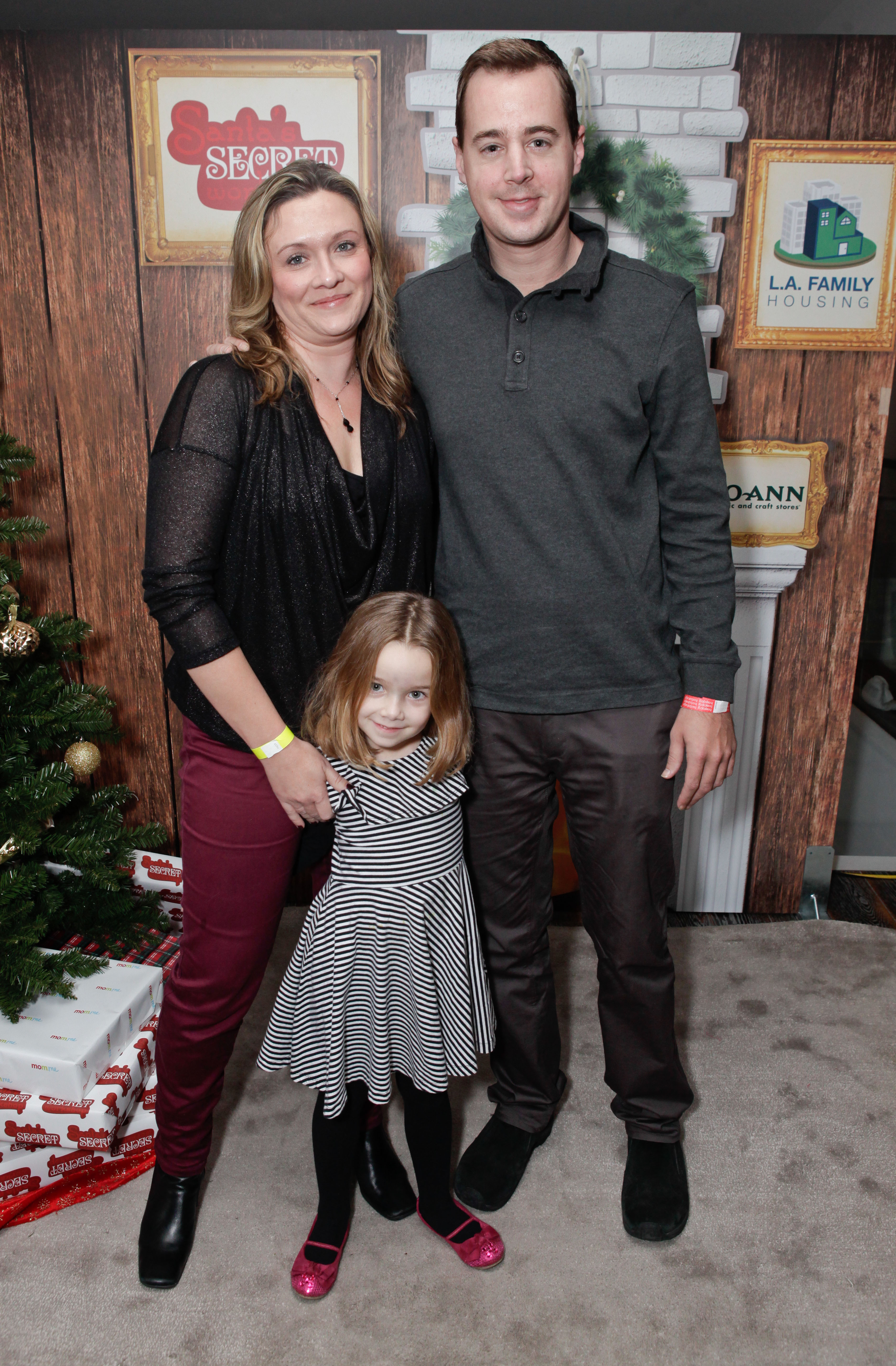 Sean Murray, his wife, and daughter, at the second annual Santa's Secret Workshop benefiting L.A. Family Housing on December 1, 2012, in West Hollywood, California | Source: Getty Images