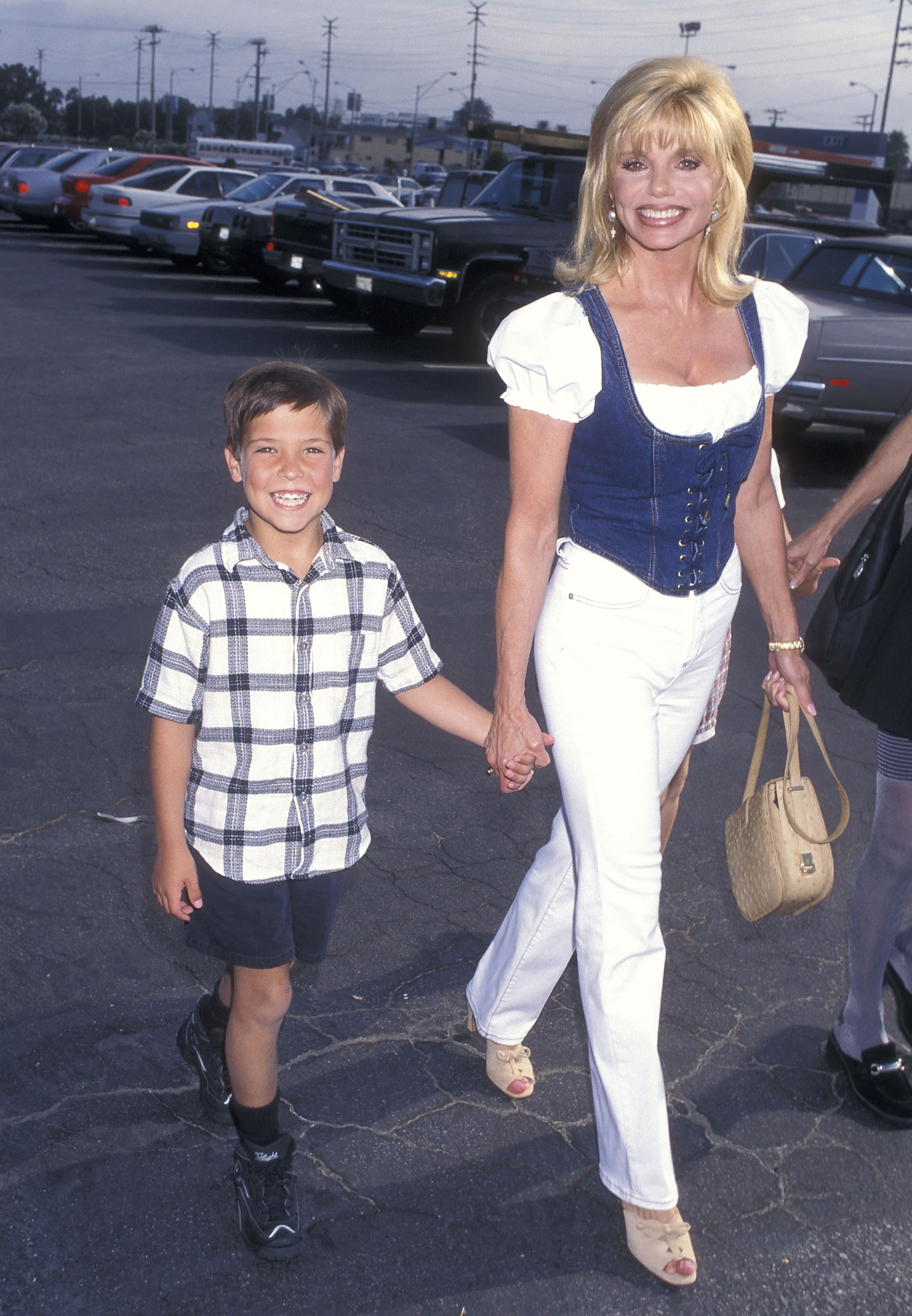 Loni Anderson and son Quinton Reynolds at "The Greatest Show on Earth" Ringling Brothers and Barnum & Bailey 127th Edition at the Great Western Forum on August 7, 1997, in Inglewood, California | Source: Getty Images
