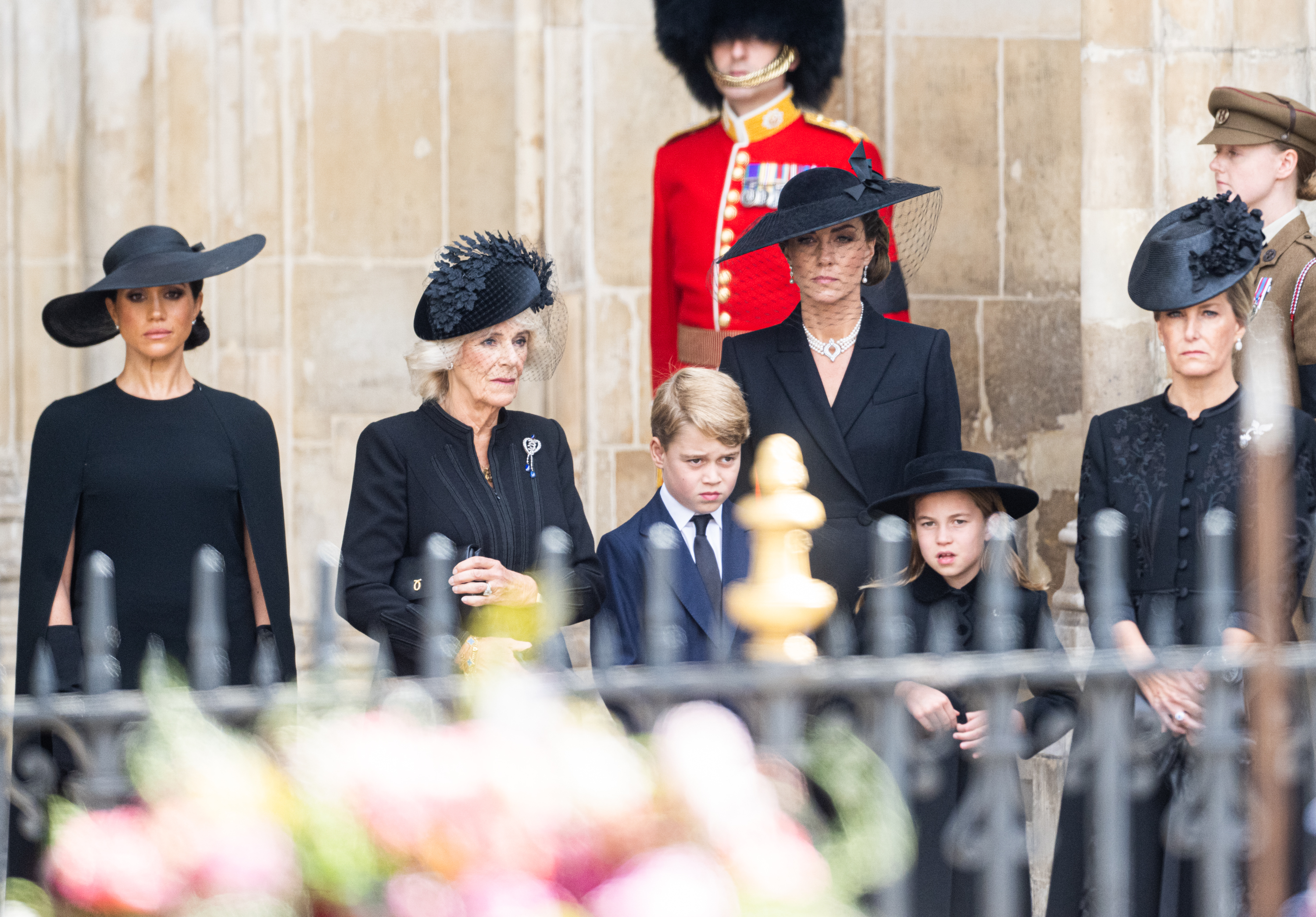 Meghan Markle, Queen Camilla, Prince George, Princess Charlotte, Princess Catherine, and Countess Sophie at the State Funeral of Queen Elizabeth II at Westminster Abbey on September 19, 2022 in London, England | Source: Getty Images