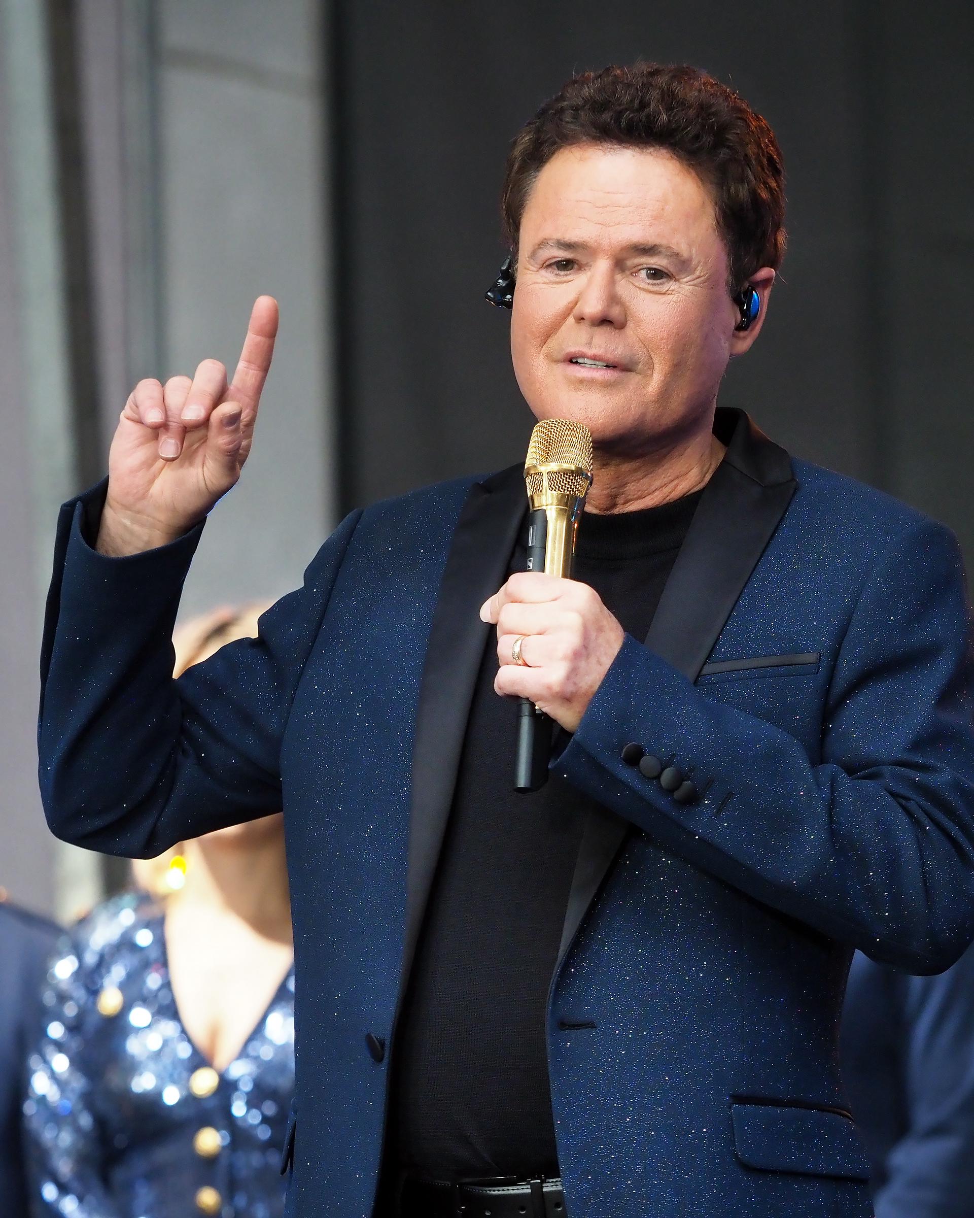 Donny Osmond performing live at the Fox & Friends Summer Concert Series in New York City on August 4, 2023 | Source: Getty Images