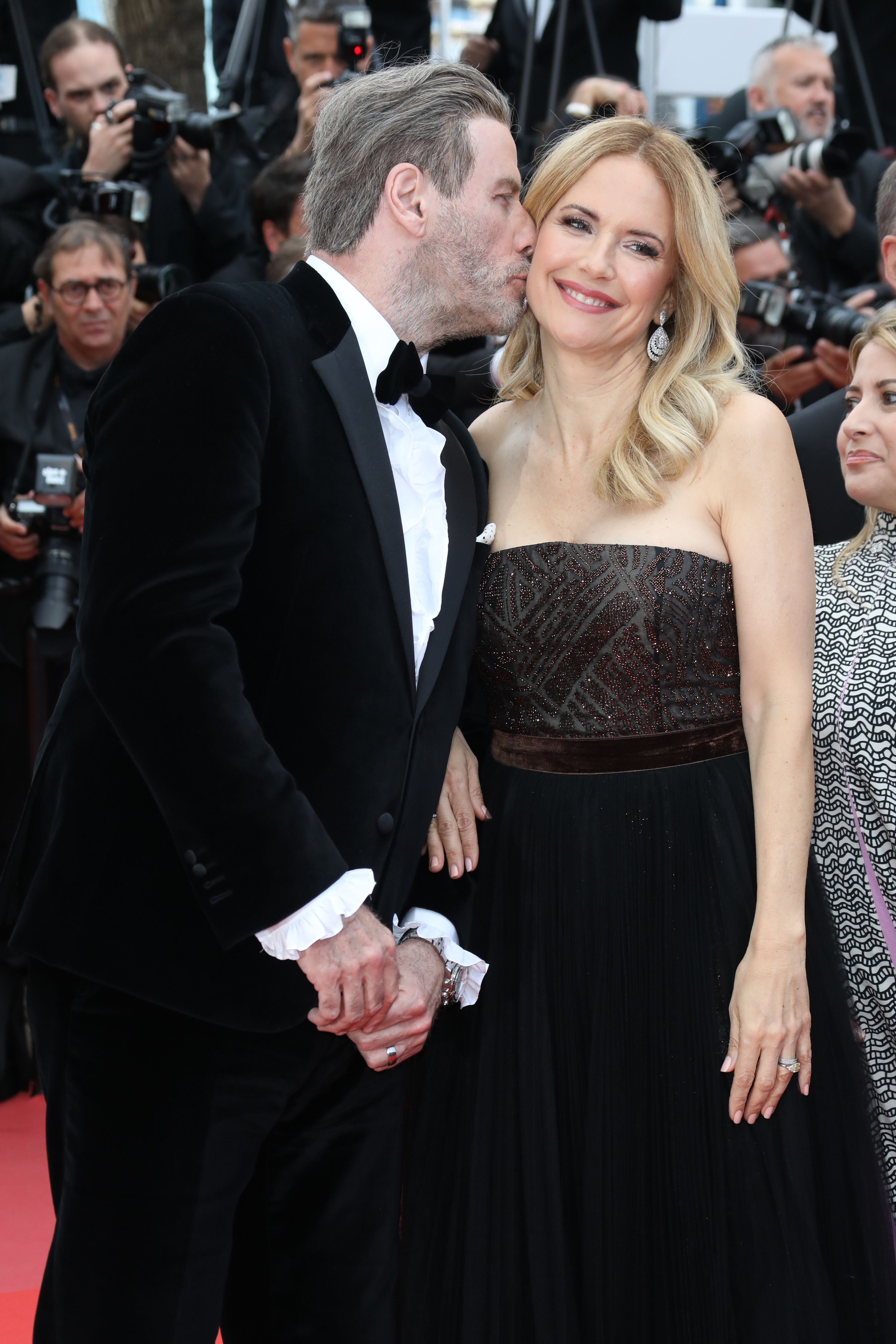 John Travolta and Kelly Preston at the screening of "Solo: A Star Wars Story" during the 71st annual Cannes Film Festival on May 15, 2018, in France | Photo: Tony Barson/FilmMagic/Getty Images