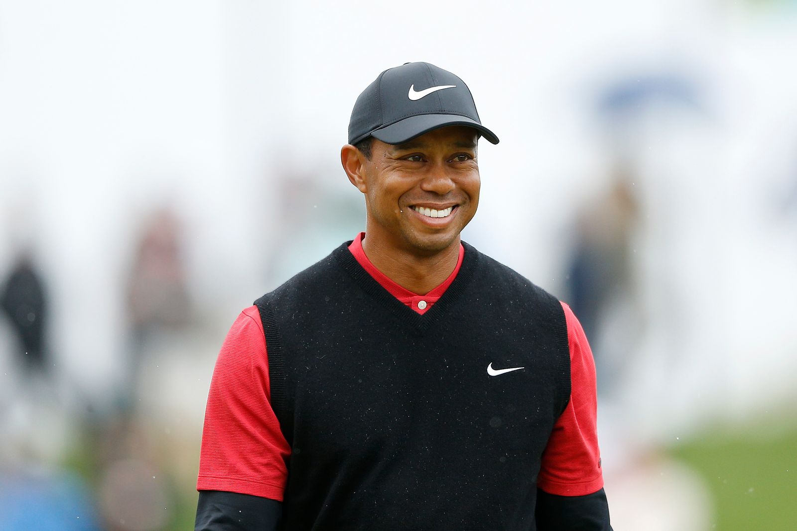 Tiger Woods reacts after chipping in from the bunker on the third hole during the final round of The PLAYERS Championship at TPC Sawgrass on March 17, 2019 in Ponte Vedra Beach, Florida. | Source: Getty Images