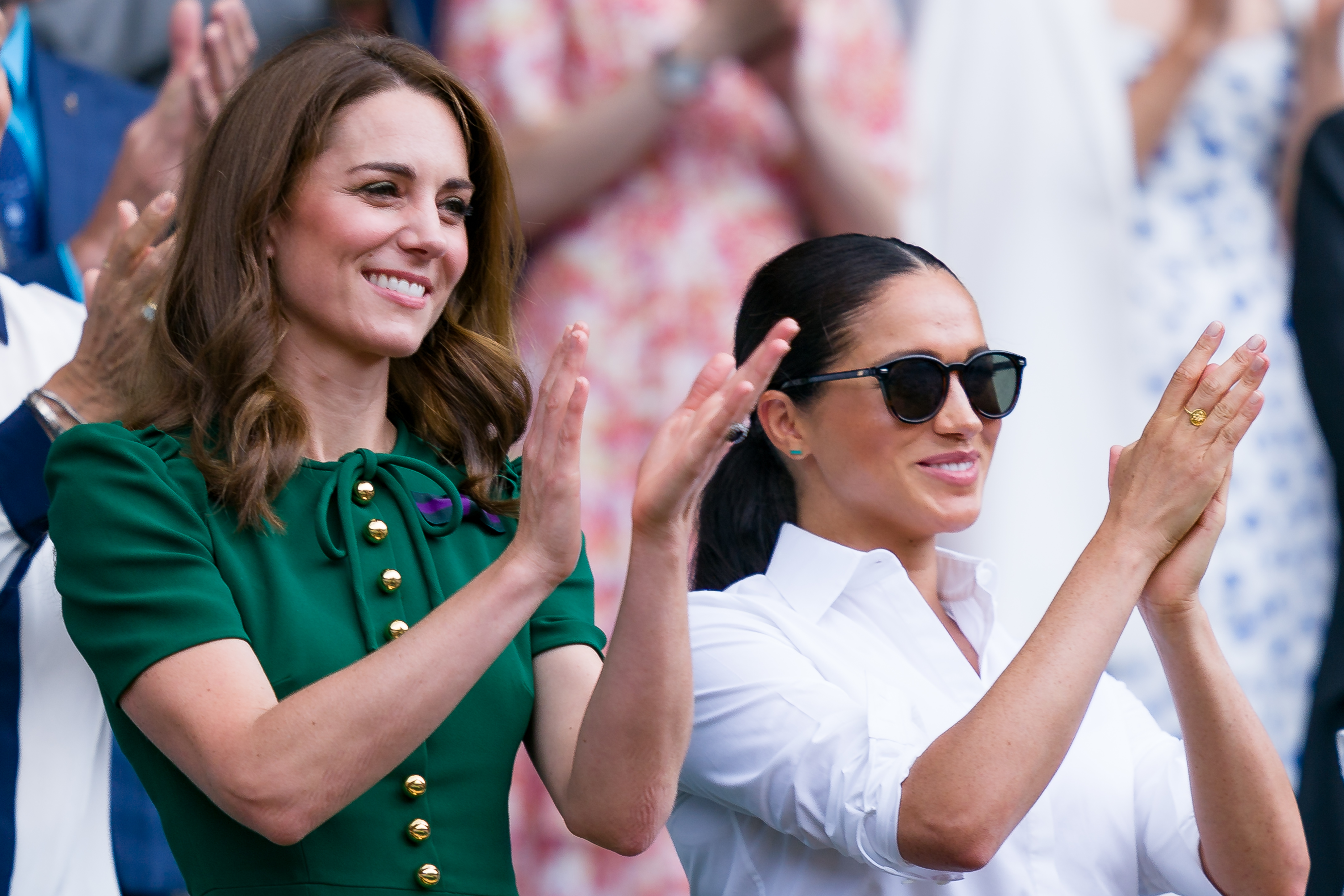 Princess Catherine and Meghan Markle at Wimbledon 2019 at All England Lawn Tennis and Croquet Club on July 13, 2019 in London, England | Source: Getty Images