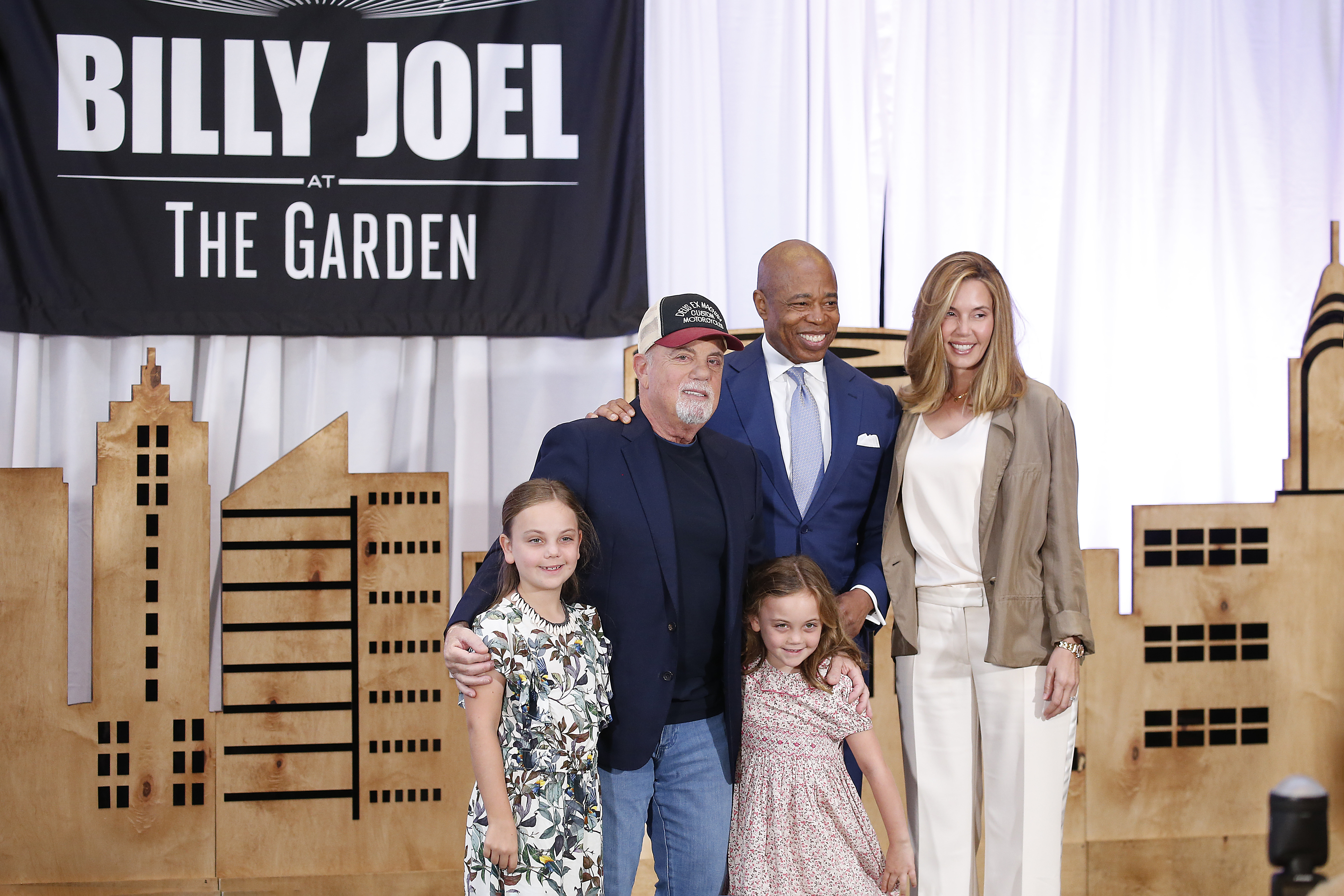Billy Joel, his wife Alexis, their daughters Remy and Della, and Mayor Eric Adams at Madison Square Garden in June 2023. | Source: Getty Images