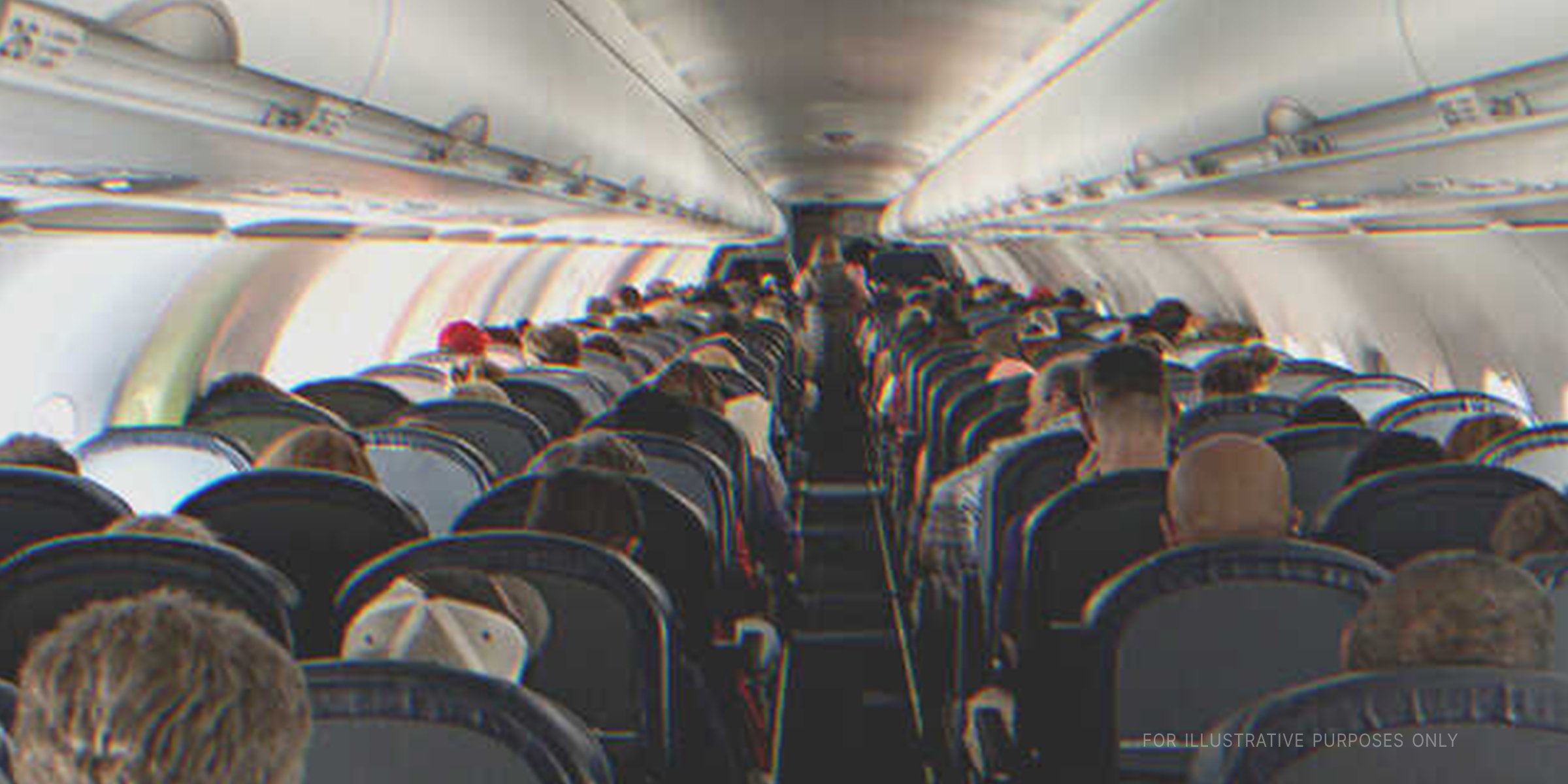 Passengers on a flight | Source: Getty Images