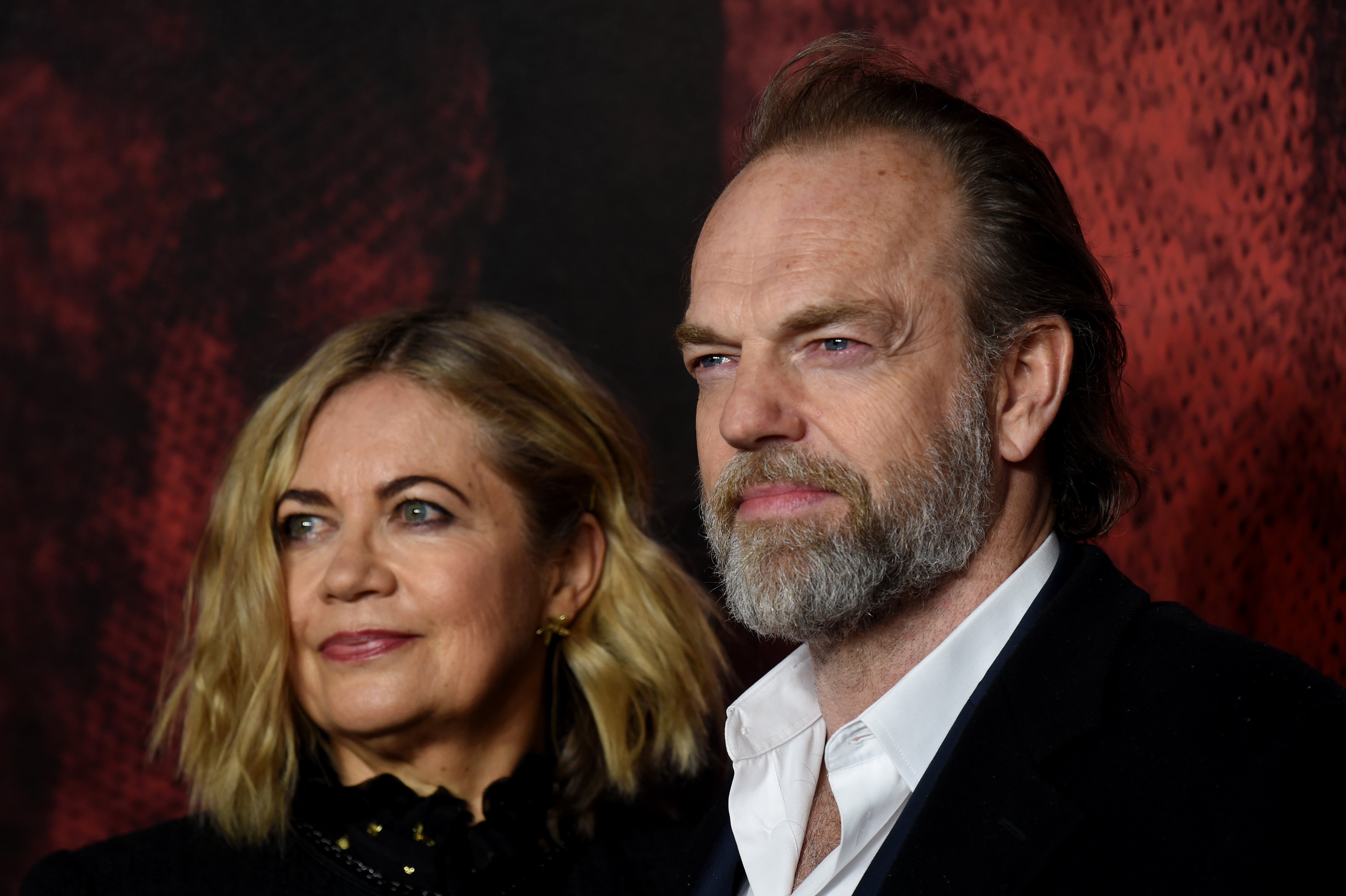Katrina Greenwood and Hugo Weaving at the global premiere of "Mortal Engines" hosted at Cineworld Leicester Square in London, England, on November 27, 2018 | Source: Getty Images